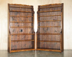 IMPORTANT PAIR OF 2.1 METER TALL REGENCY HARDWOOD WATERFALL LiBRARY BOOKCASES