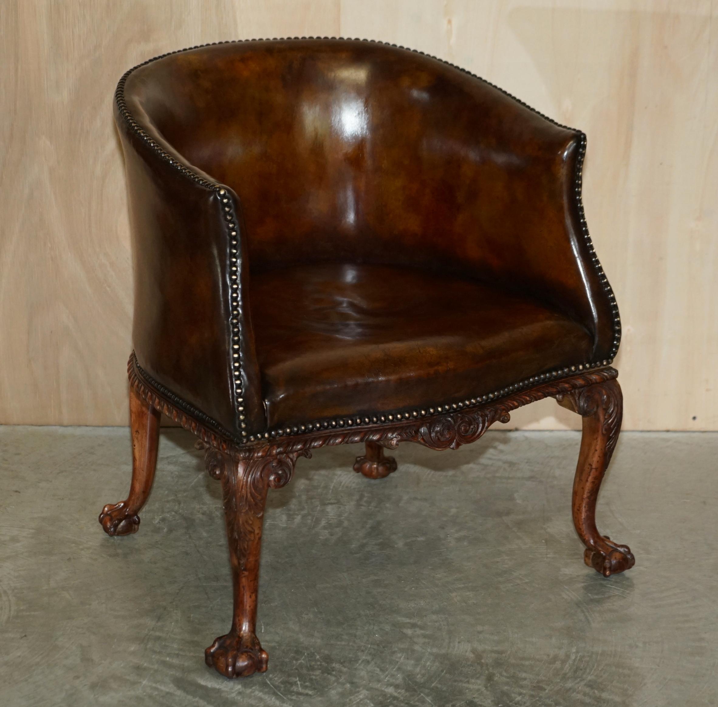 We are delighted to offer for sale this important pair of Thomas Chippendale style, heavily carved with Claw & Ball Cabriolet legs, brown leather, library tub armchairs.

These are the finest pair of library reading armchairs I have ever seen, they