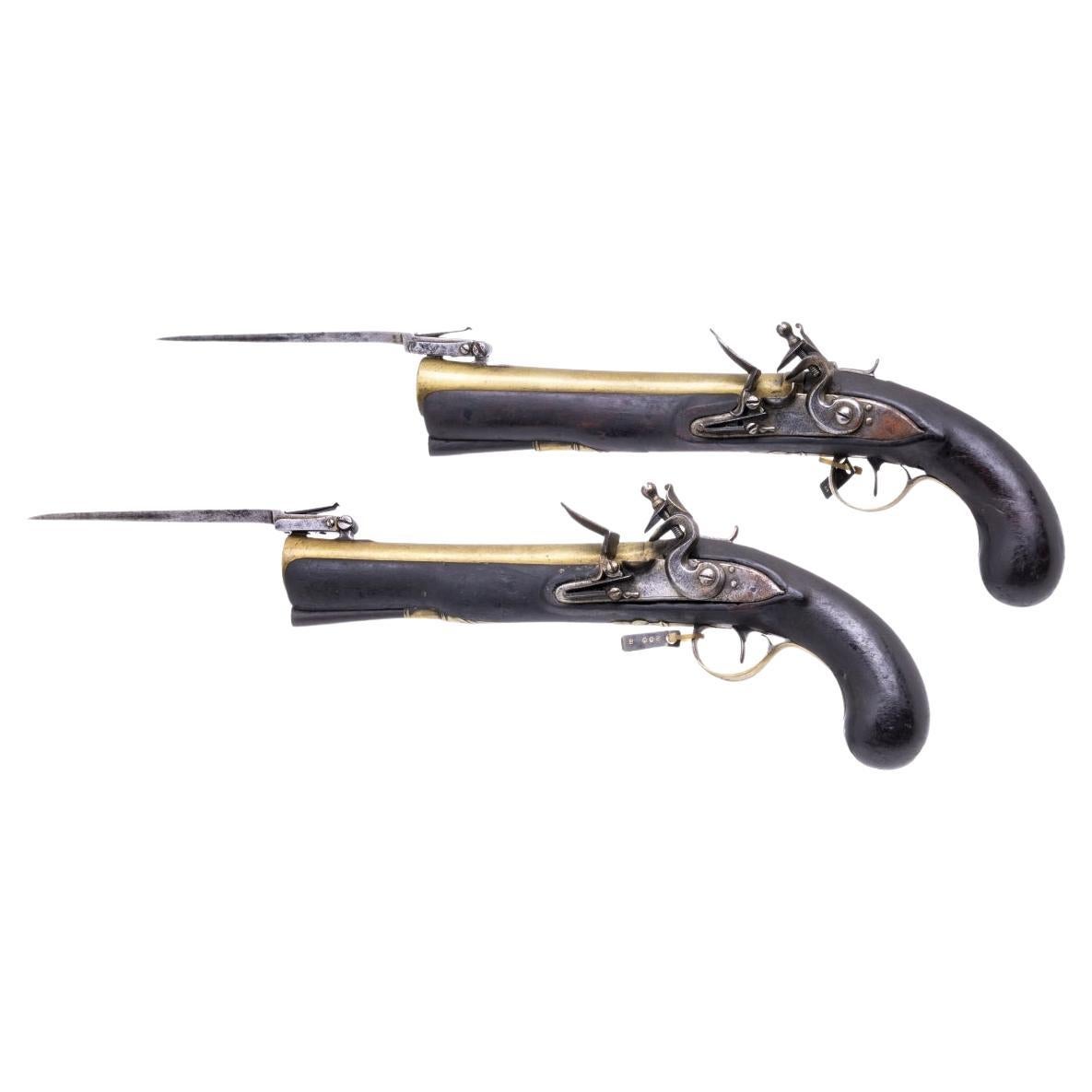 Important Pair of British Navy Pistols from the Beginning of the 19th Century