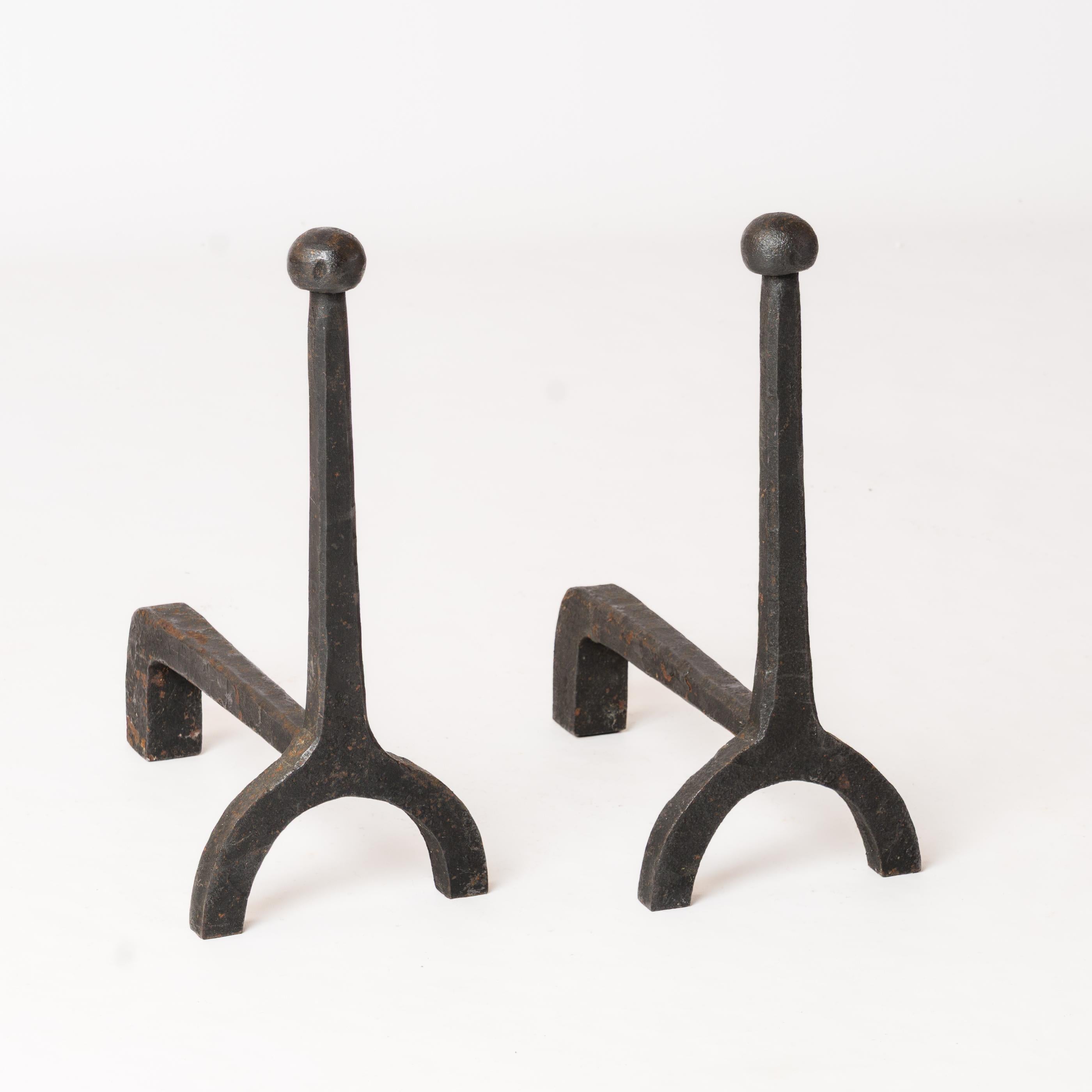 Chic and minimalist pair of wrought iron andirons with 