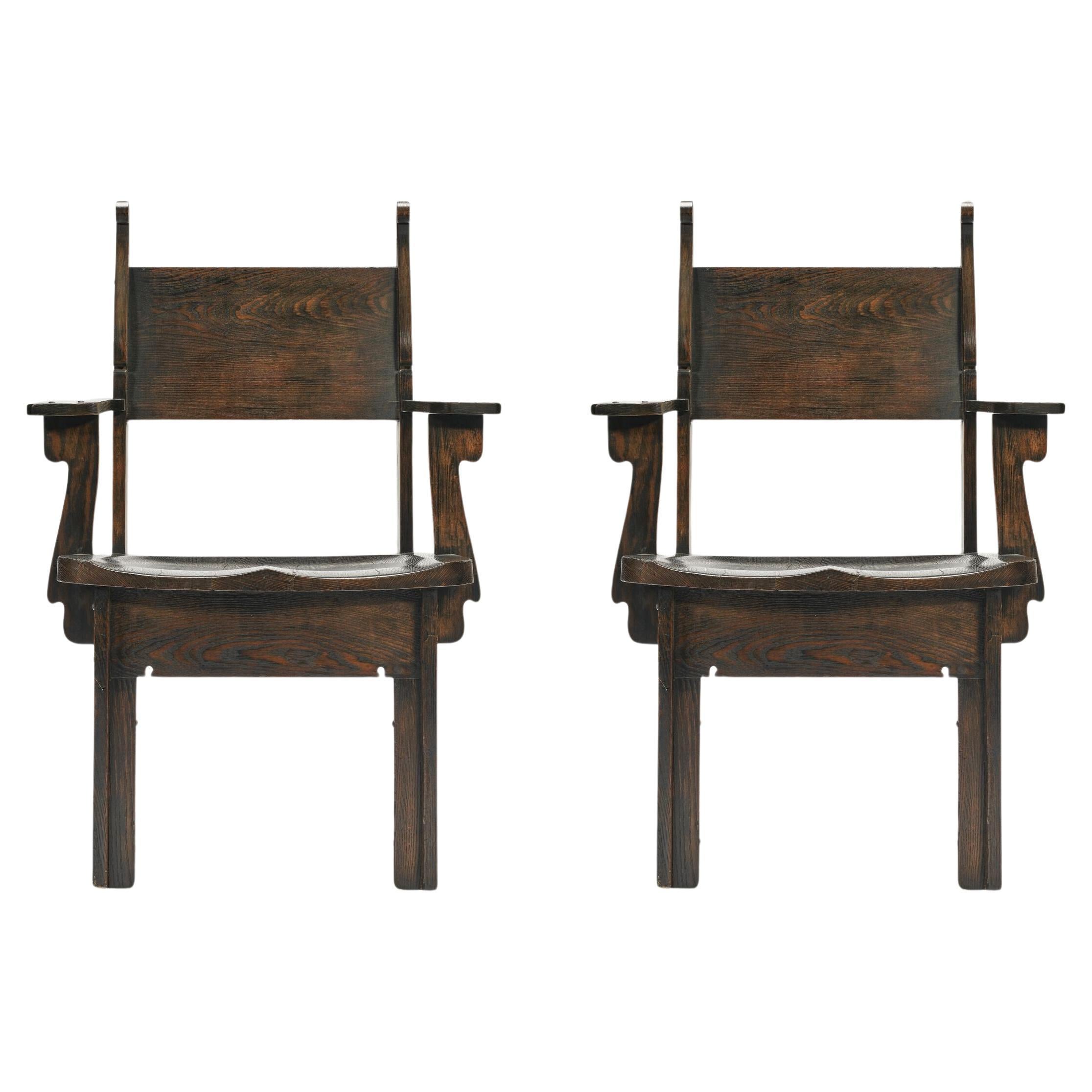 Importante coppia di poltrone in Oak Oak di Charles Rohlfs, firmate e datate 1904