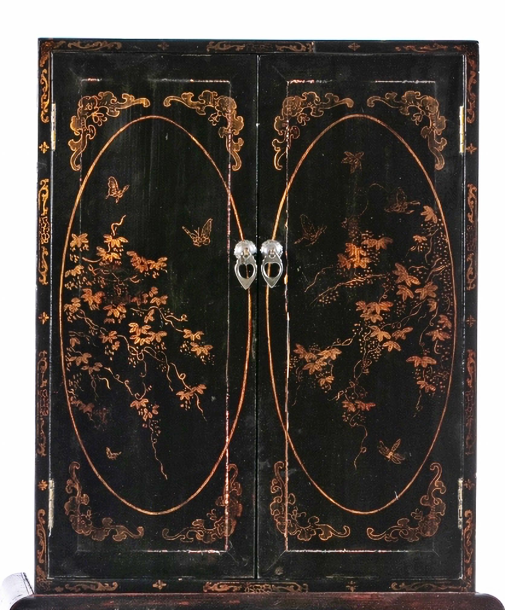 PAIR OF CHINESE CABINETS 19th Century

Of export
19th century in black lacquered wood with gilt representing plant motifs. 
Upper body with two doors, lower body notched and hollowed out. 
Small defects. 
Dim.: 168 x 69 x 41 cm.
very good condition