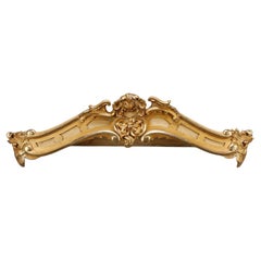 Important pair of Louis XV style valances in carved and gilded wood