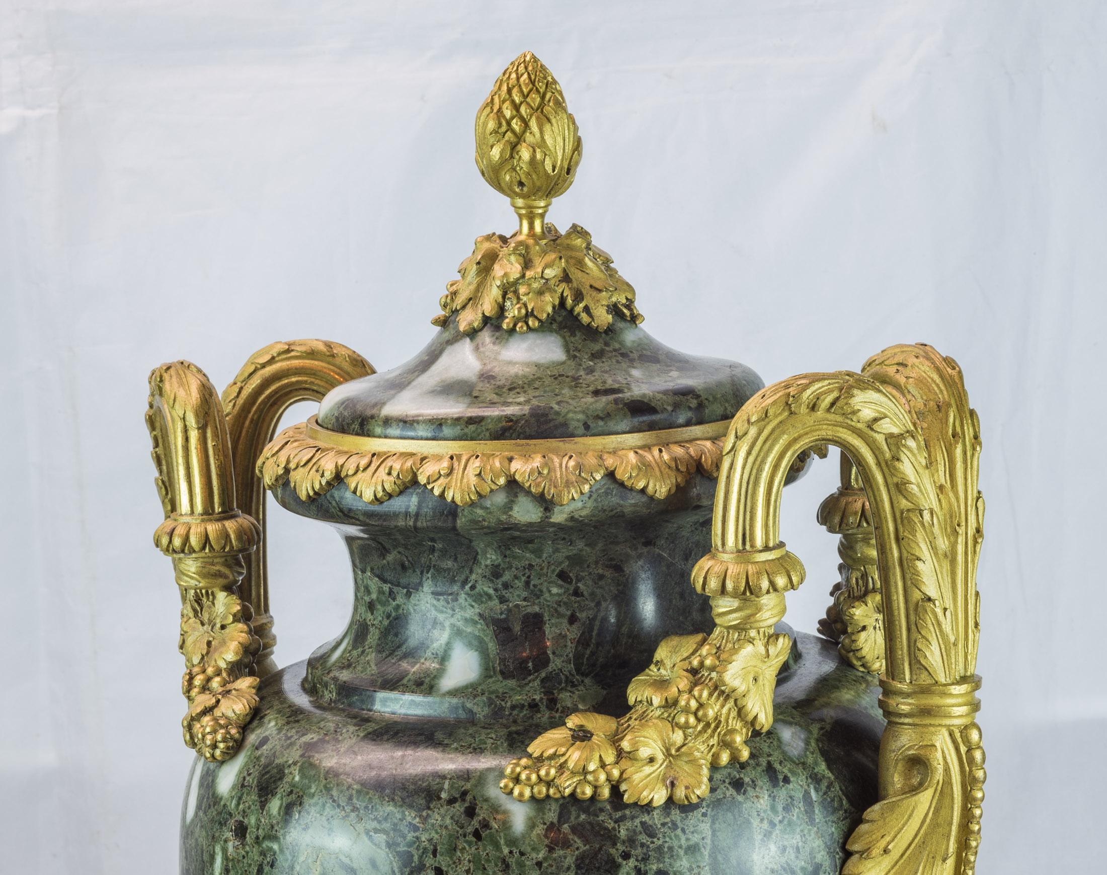 Carved Important Pair of Louis XVI Style Ormolu-Mounted Green Marble Vases For Sale