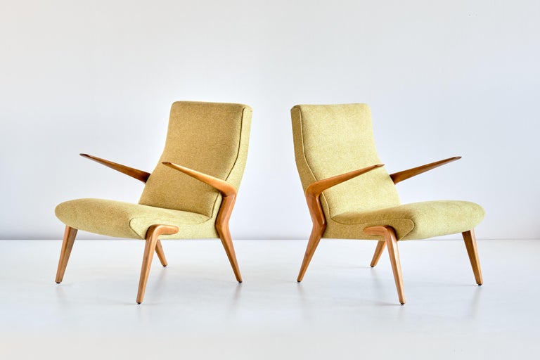 This important pair of armchairs was designed by Osvaldo Borsani and produced by Tecno in Como, Italy in 1954. The very rare P71 was one of the first designs produced by Tecno after the company was founded by Osvaldo Borsani and his brother