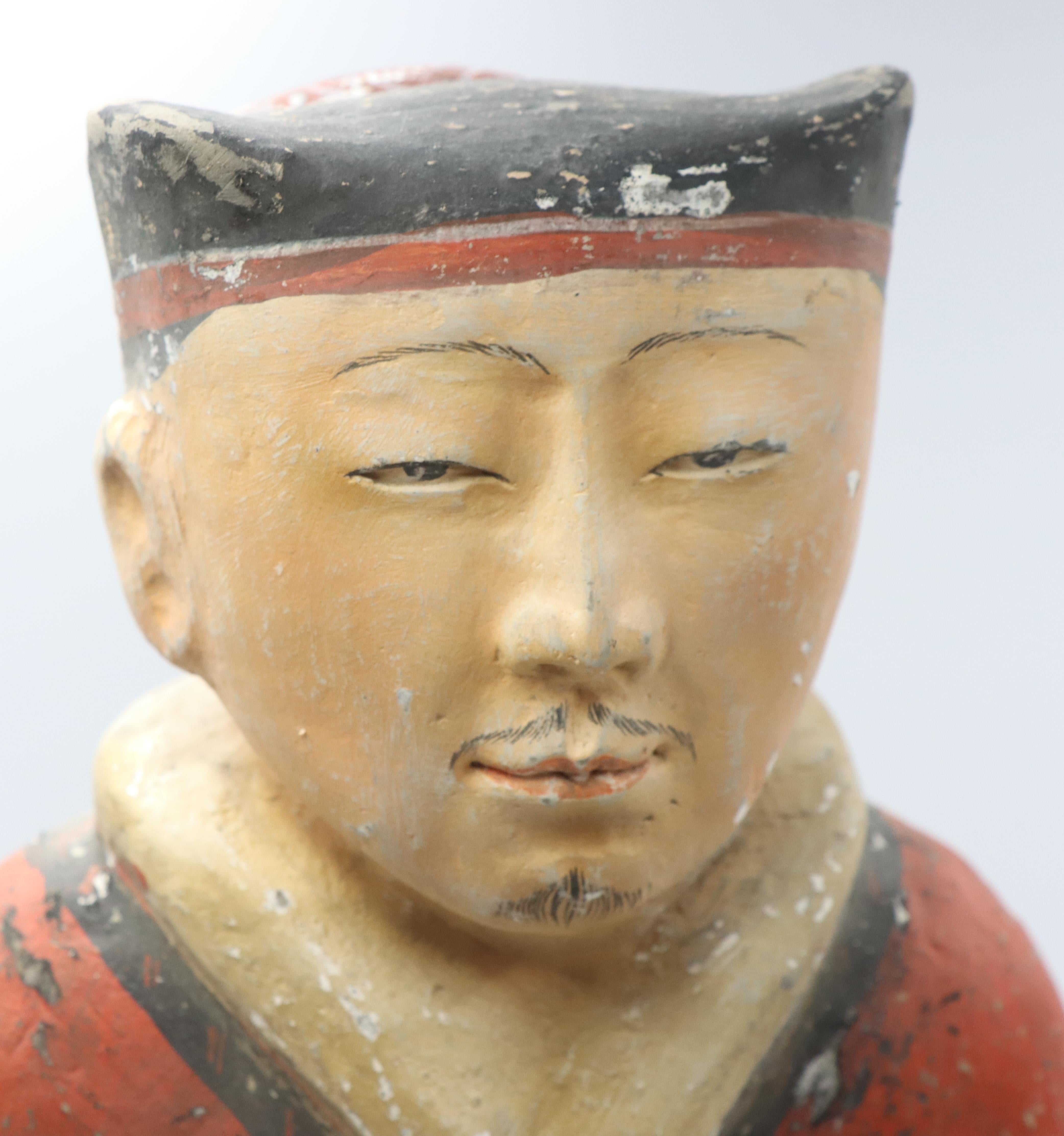 Important pair of rare polychrome Han warriors. These are from the Han Dynasty. Uniquely expressive faces with lots of detail. They have expressive squinted eyes, a small nose, and detailed mouths with some facial hair on the upper lip, as well as
