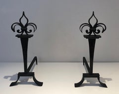 Important Pair of Wrought Iron Andirons with a Lily Flower