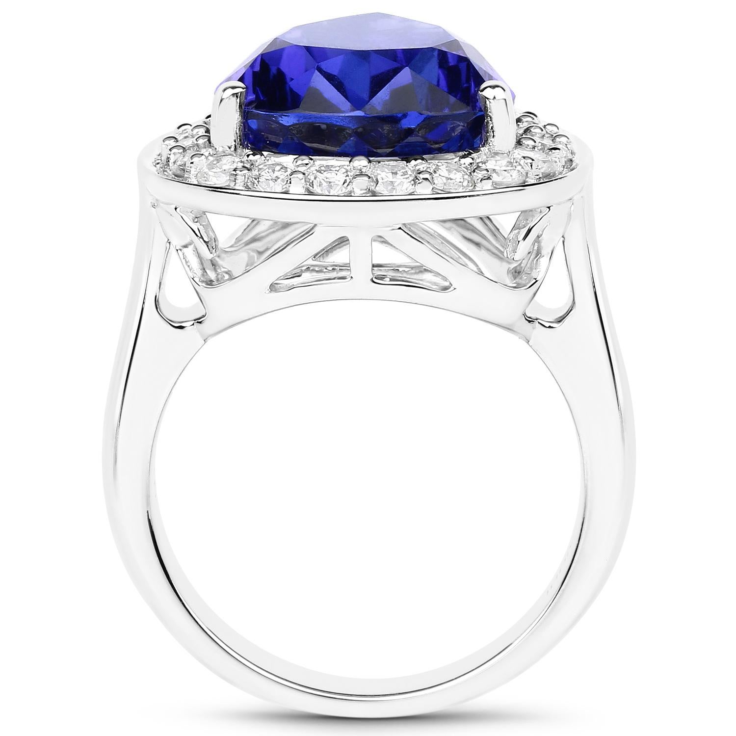 Important Pear Shape Tanzanite Ring Diamond Halo 12.3 Carats Total 18K Gold In Excellent Condition For Sale In Aliso Viejo, CA