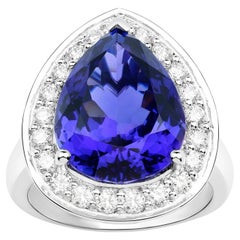 Important Pear Shape Tanzanite Ring Diamond Halo 12.3 Carats Total 18K Gold