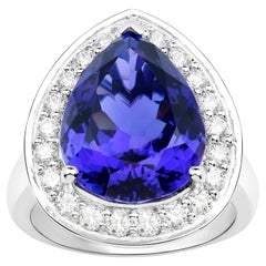 Important Pear Shape Tanzanite Ring Diamond Halo 12.3 Carats Total 18K Gold