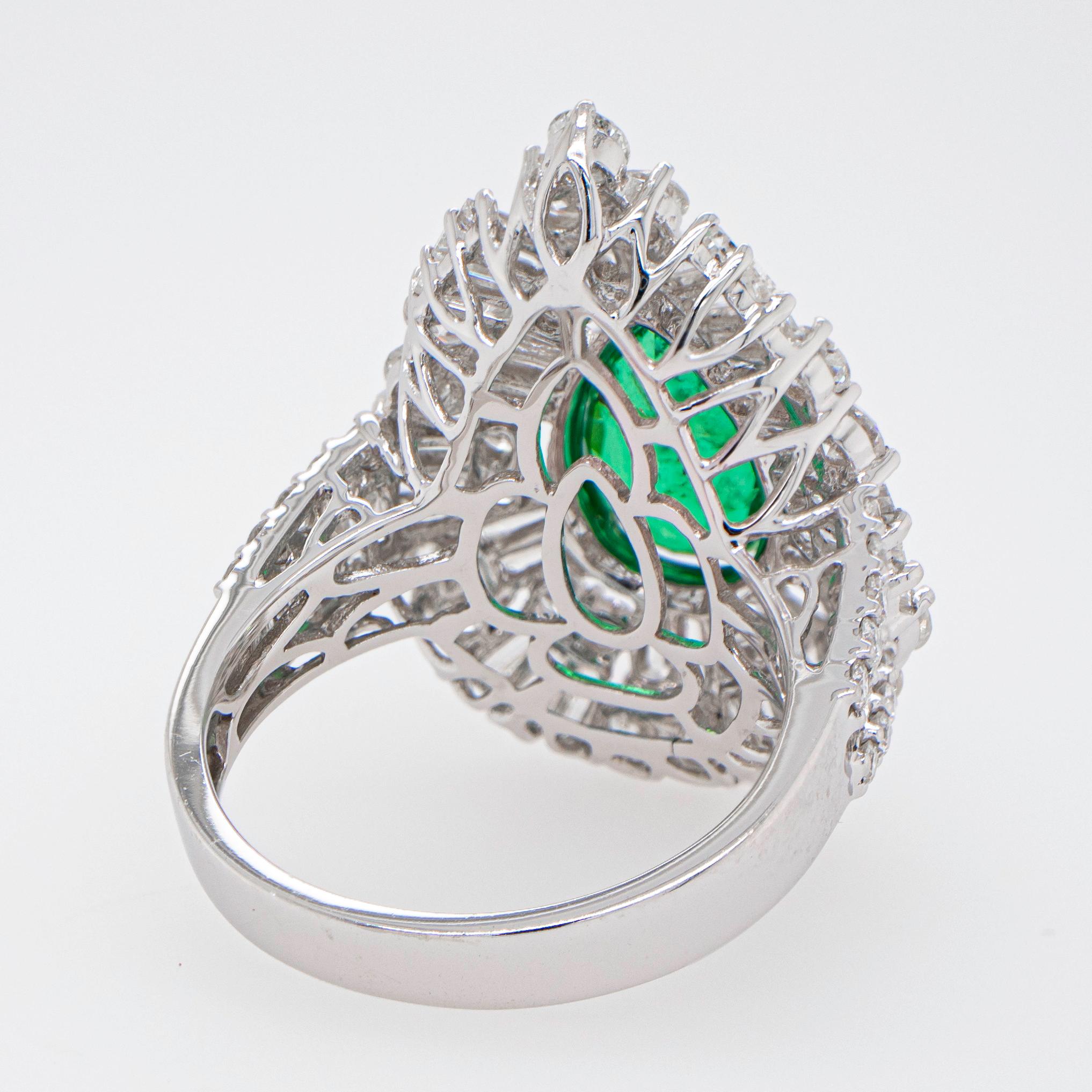 Contemporary Important Pear Shaped Emerald Ring 2.25 Carat Set in Diamond Setting 3.45 Carats