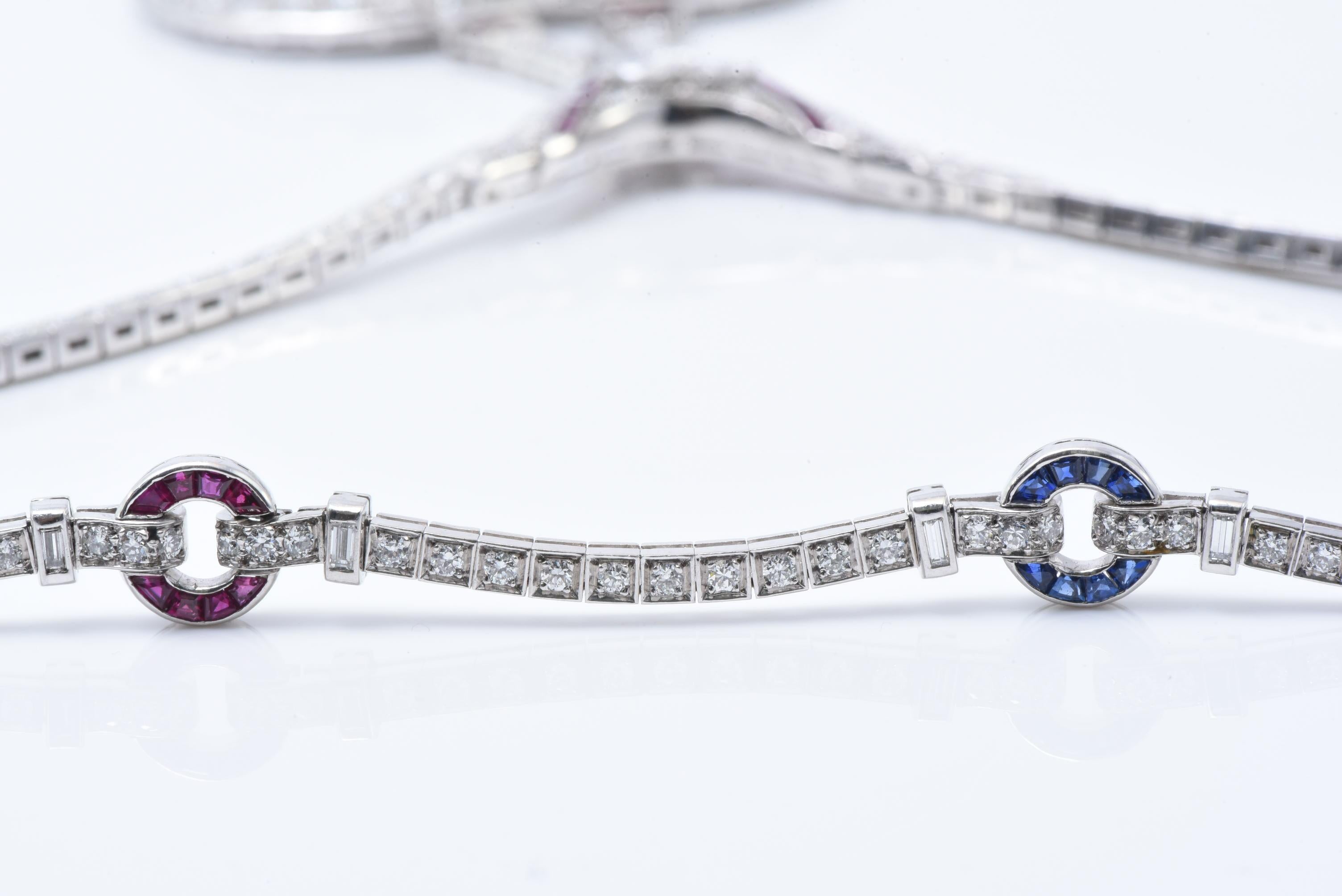 Important Platinum Diamond Ruby and Sapphire Heart Pendant Necklace In Excellent Condition In New York, NY