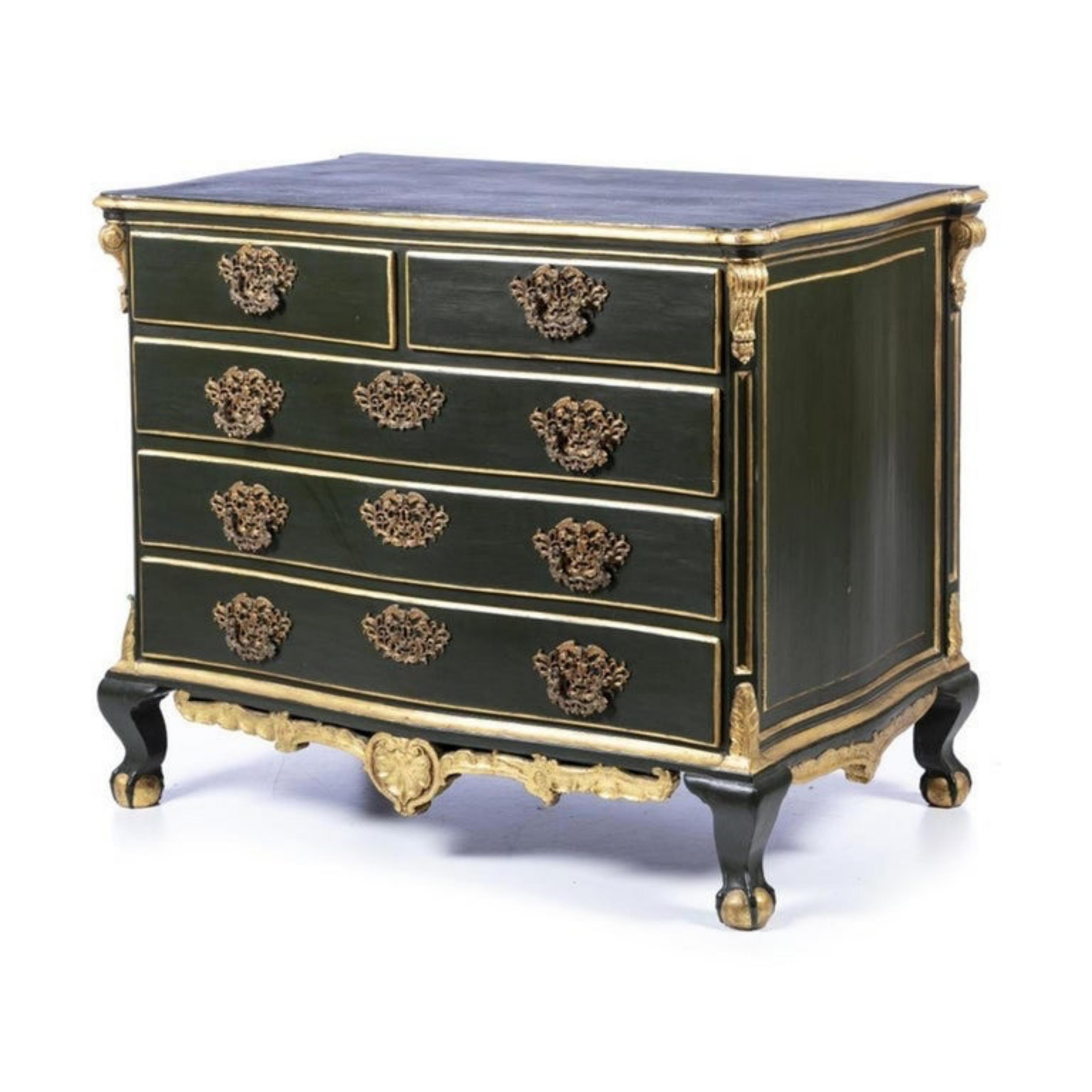 Portuguese dresser 18th century

In painted and gilded wood, with two drawers and three drawers. Wavy body, protruding carved pilasters, decorated with vegetal windings, scalloped skirt Resting on four feet ending in claw and ball. 
Bronze fittings.