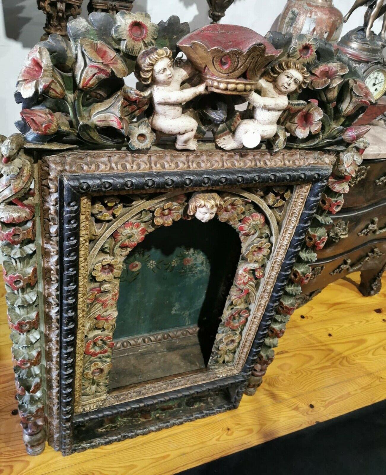 Title: Portuguese Oratory cabinet
Date/Period: 17th century
Dimension: 117cm x 78cm x 30cm, carved wood
Materials: Carved wood, gilded
Additional information: Oratory cabinet the 17th century, carved wood, gilded with sculptures in the form of