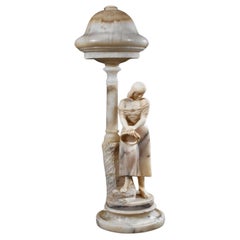 Importante et rare lampe en albâtre du 19e siècle, de qualité muséale, représentant une jeune femme avec une cruche