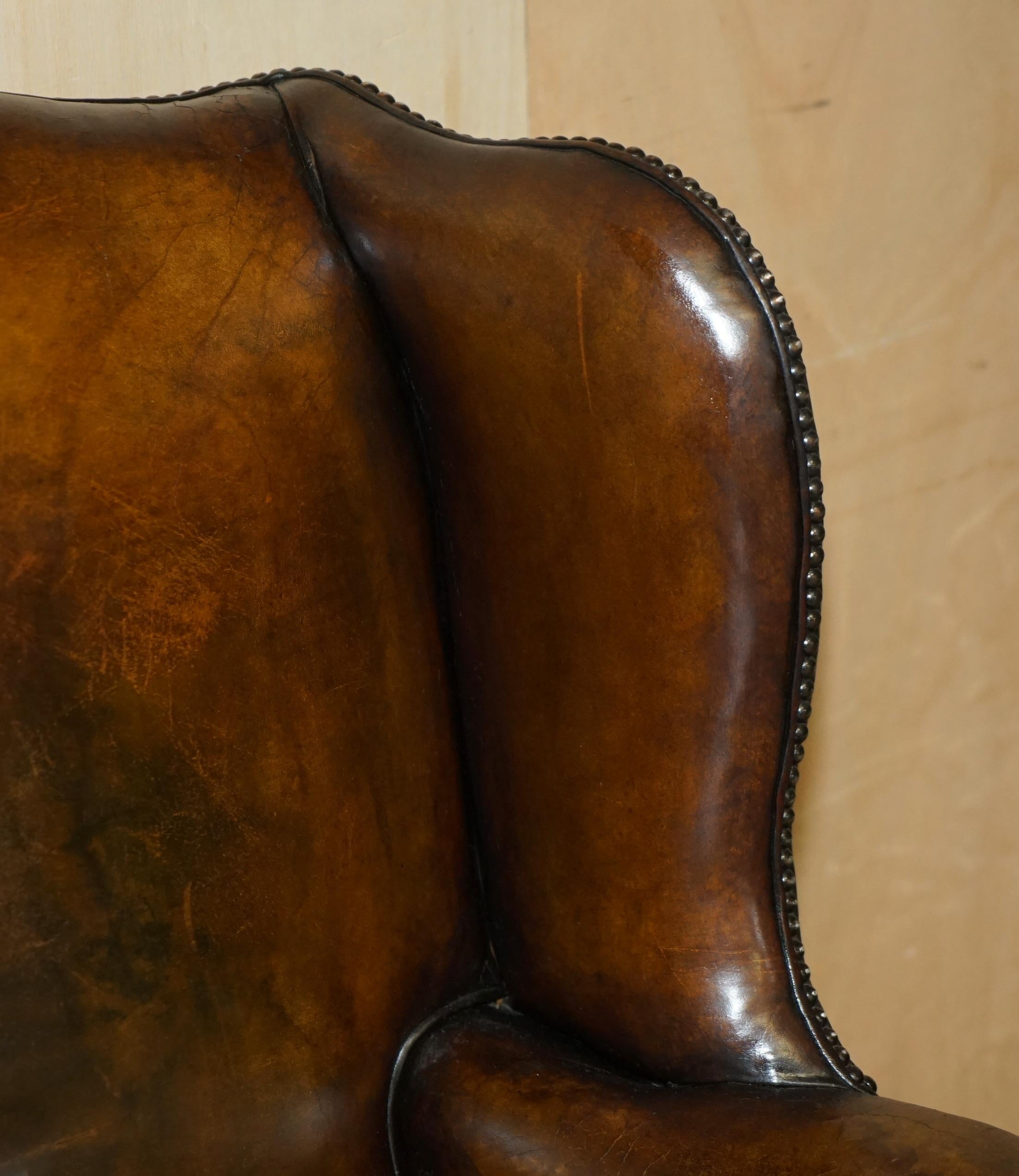 Hand-Crafted IMPORTANT RESTORED GEORGE II PERIOD CIRCA 1760 WiNGBACK BROWN LEATHER ARMCHAIR For Sale
