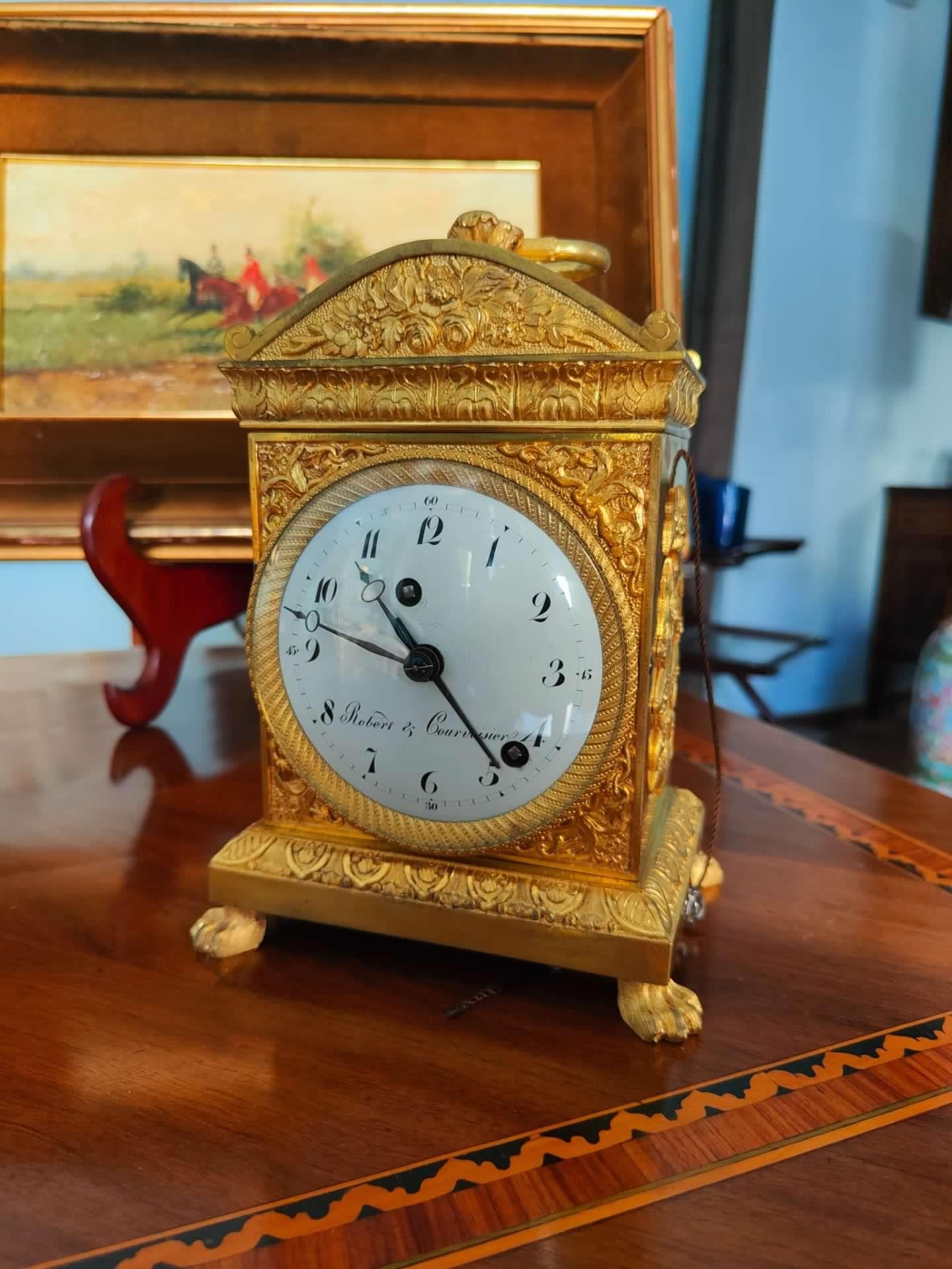 Important Robert & Courvoisier marshal clock, grand sonnerie. Verge movement, grand alarm upon passage and recall, alarm, selection lever for small and grand alarm and silence. 
Excellent condition Original gilding 
The watch still has its original