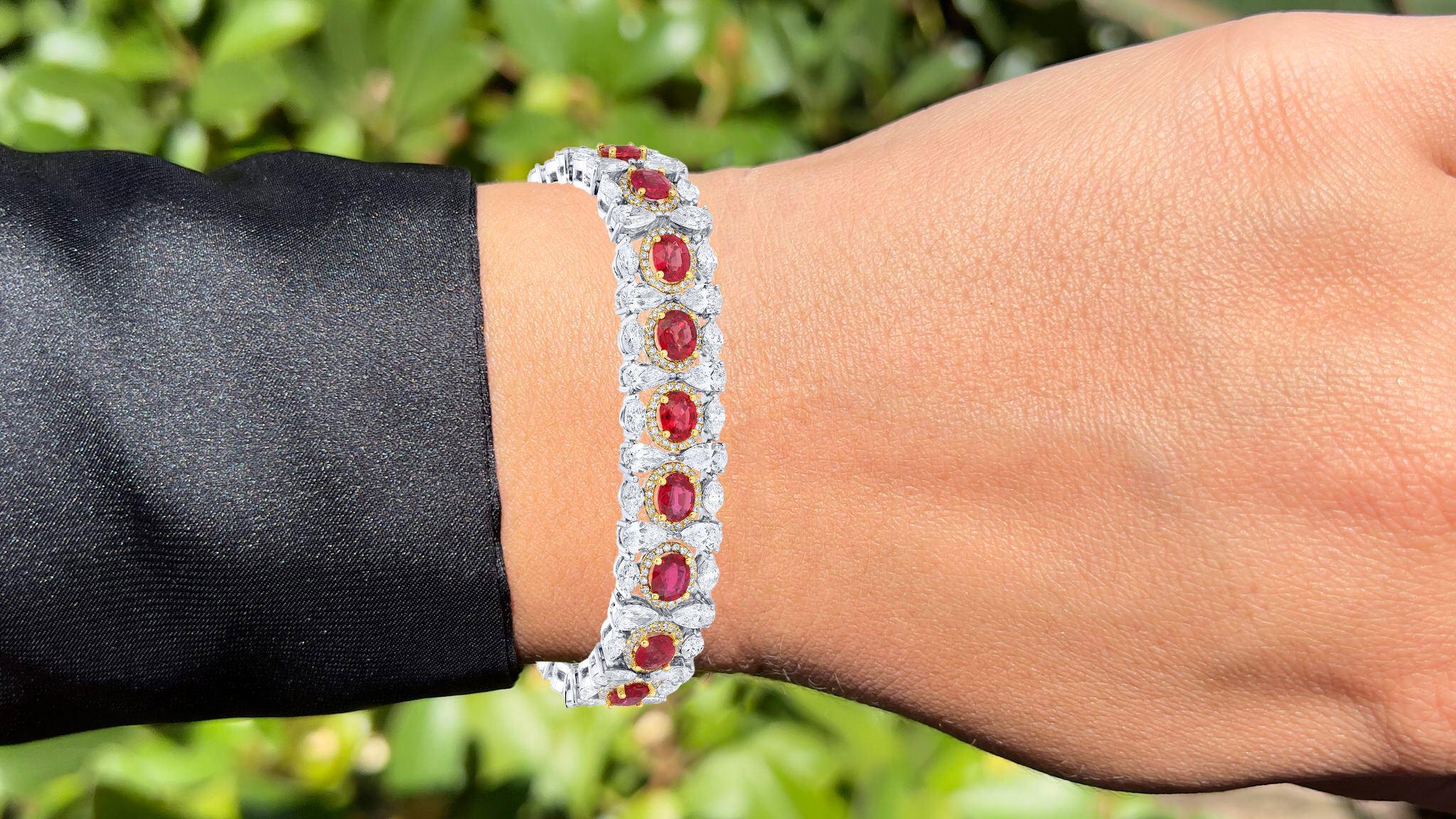 It comes with the Gemological Appraisal by GIA GG/AJP
All Gemstones are Natural
18 Rubies = 13.77 Carats
Cut: Oval
432 Diamonds =  17.13 Carats
Cut: Pear, Round, Marquise
Metal: 18K White and Yellow Gold
Length: 7 Inches