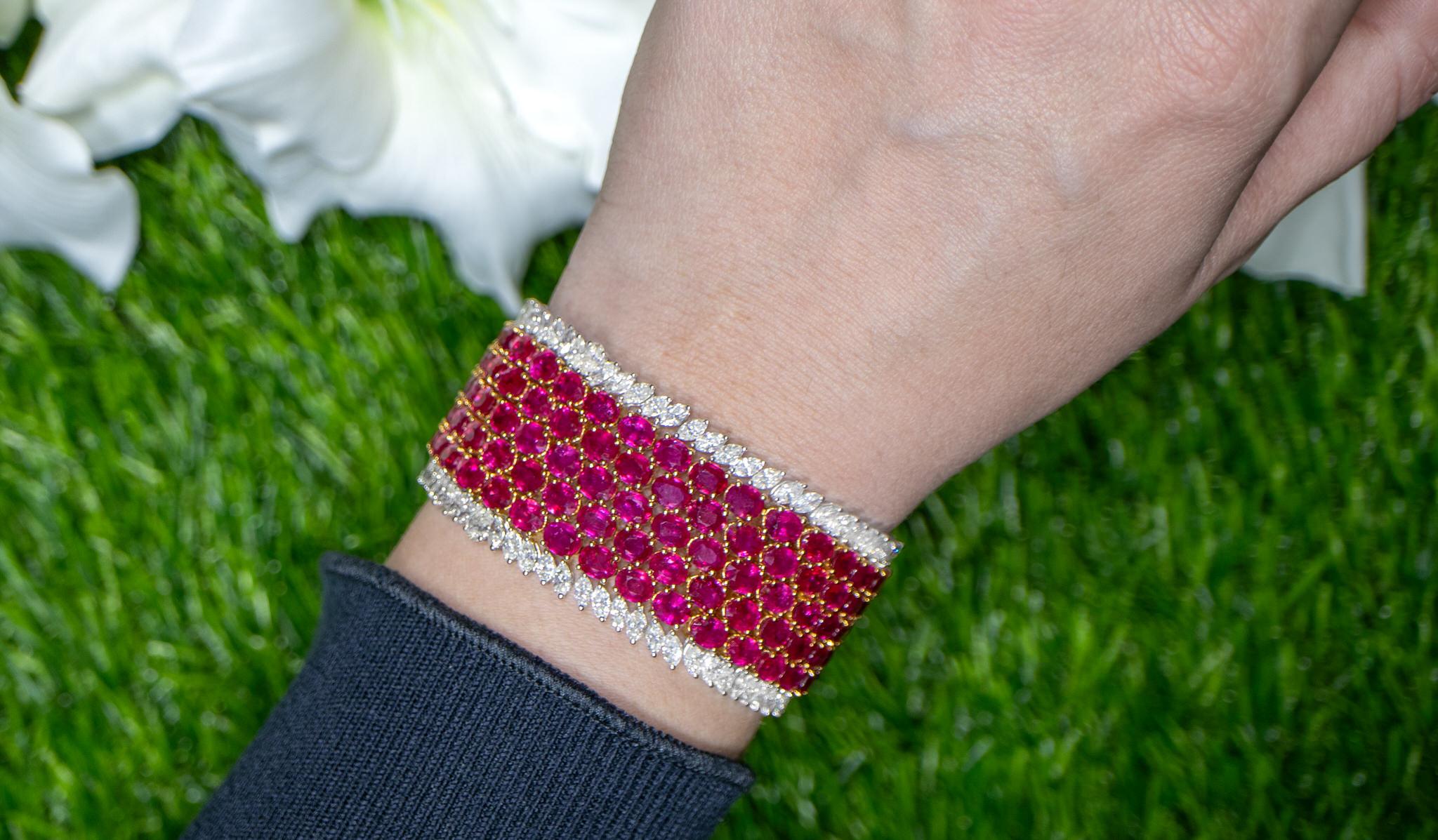It comes with the Gemological Appraisal by GIA GG/AJP
All Gemstones are Natural
Rubies = 74.00 Carats
Diamonds = 12.20 Carats
Cut: Marquise, Pear; Clarity: F-H; Clarity: VS-SI
Metal: 18K Yellow & White Gold
Length: 7 Inches
Width: 1.18 Inches