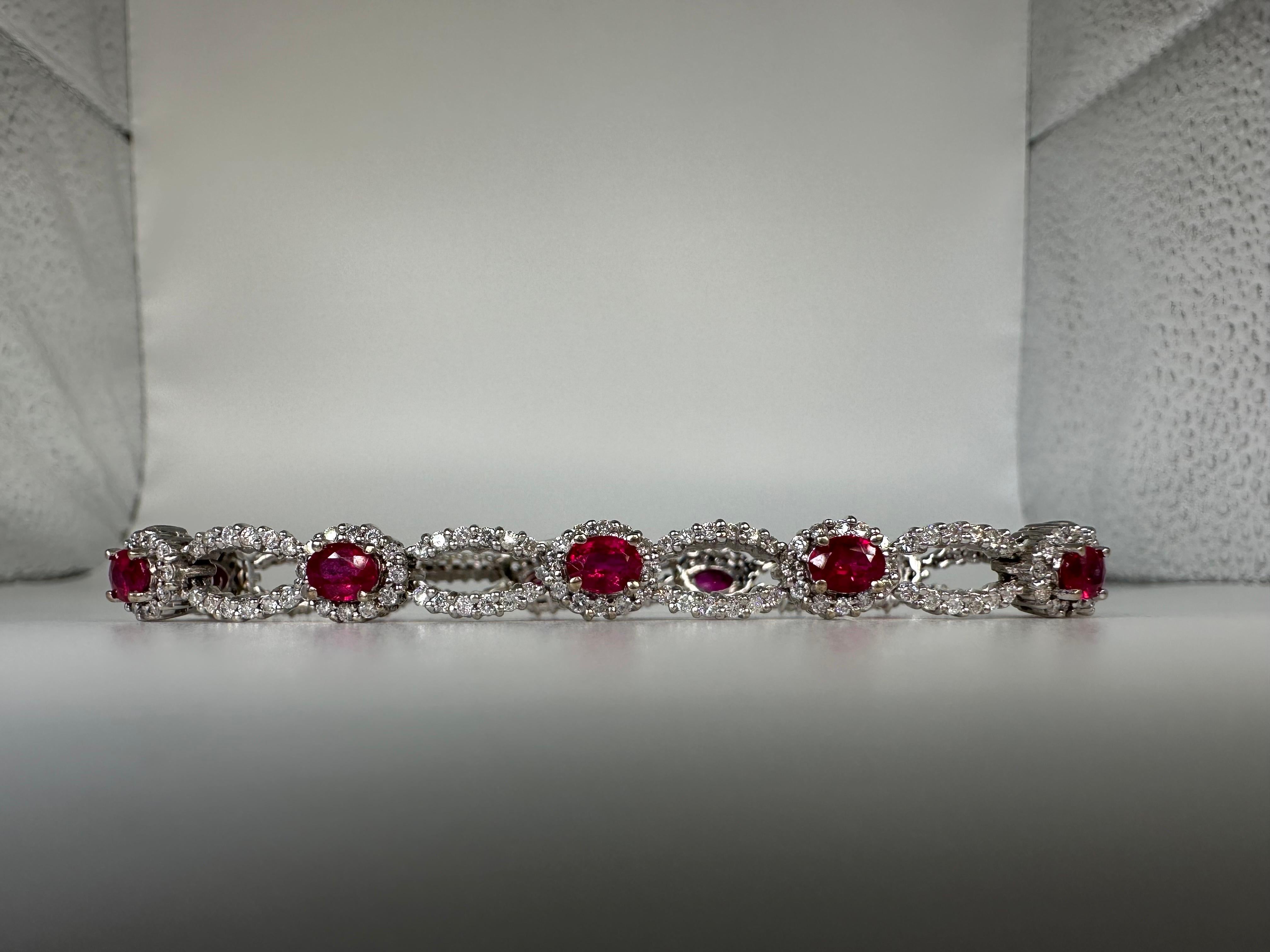 Incredible matching ruby bracelet made with natural diamonds and natural rubies. Sparkling luxurious beauty and so rare to find so many matching naturl rubies (untreated)

GOLD: 18KT gold
NATURAL DIAMOND(S)
Clarity/Color: SI/G
Carat:2.20CT
Cut:Round
