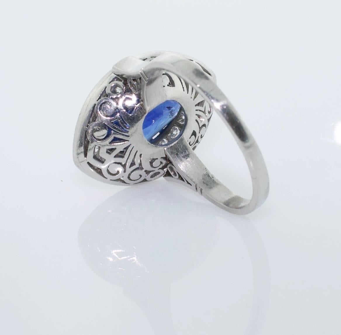 Important Sapphire and Diamond Ring in Platinum Circa 1960's
Featuring a Beautiful Marquise Cut Blue Sapphire weighing 5.10 carats (approximately)
Fifty Six Diamonds weighing .80 carats (approximately)
Very Fine and Unusual Filagree Work on The