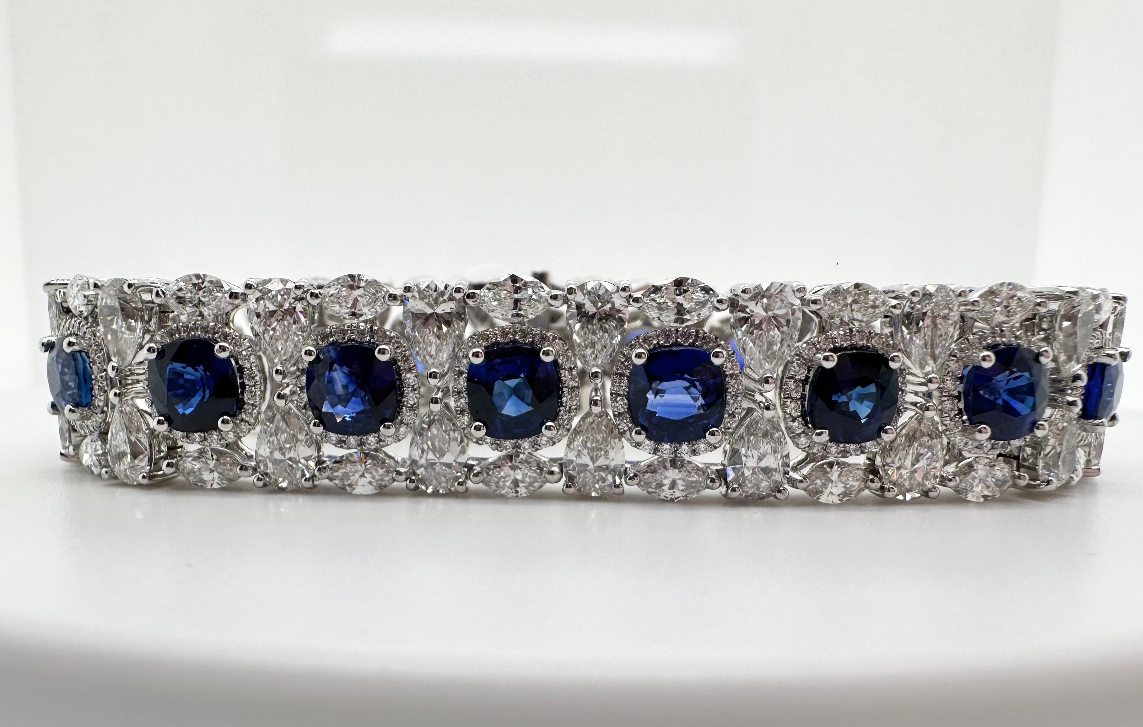 Well crafted sapphire and diamond bracelet with matching Ceylon sapphires and diamonds in 18KT white gold, exquisite craftsmanship throughout!

Metal Type: 18KT
Gram Weight:46.40 grams 

Natural Sapphire(s):
Color: Blue
Cut:Cushion
Carat: