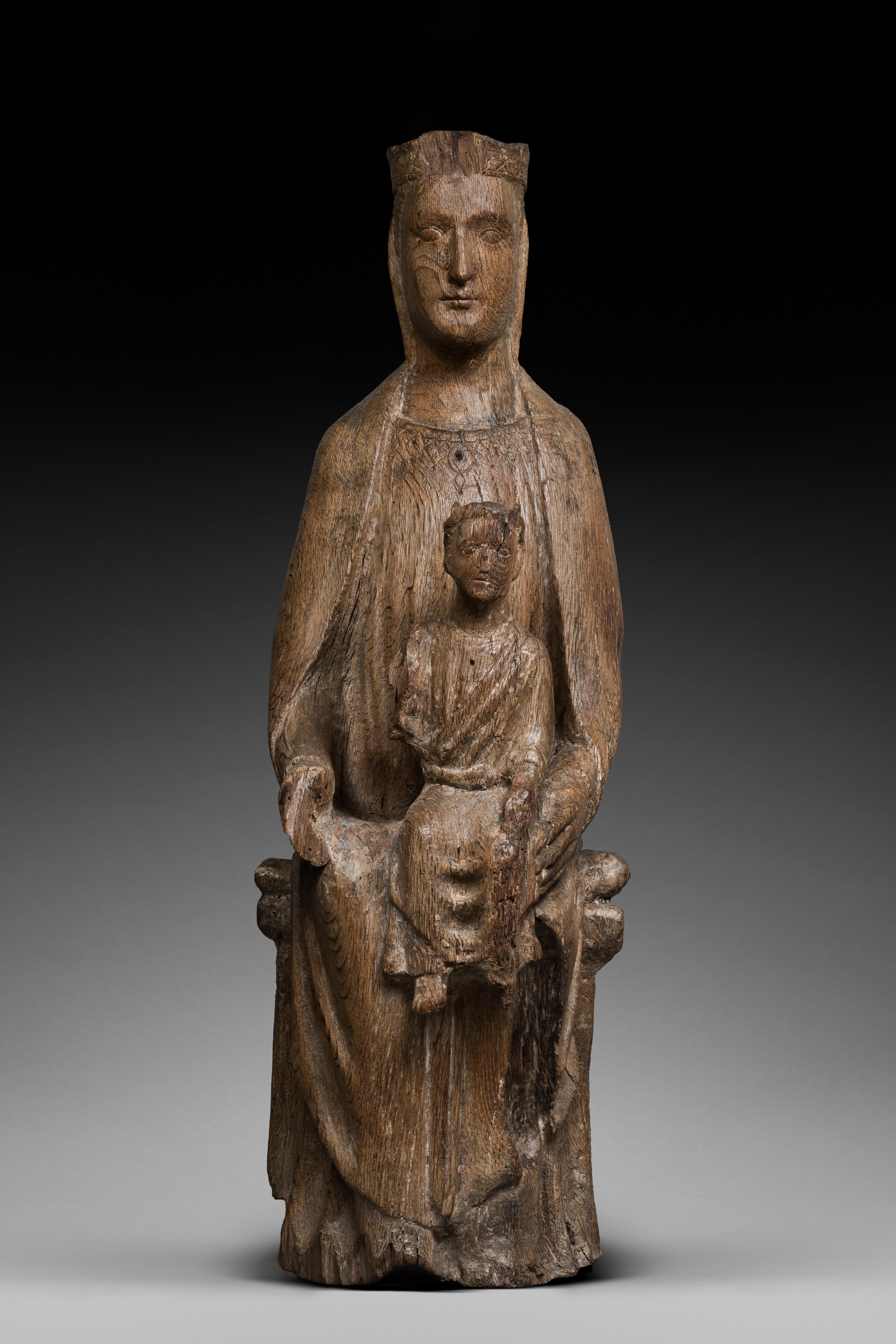 IMPORTANT SEDES SAPIENTIAE VIRGIN AND CHILD 
ALSO CALLED « THRONE OF WISDOM »

ORIGIN: FRANCE, BURGUNDY
PERIOD: EARLY 13th CENTURY

Height : 75 cm
Length : 24 cm
Depth : 17 cm

Oakwood, traces of polychromy, hollowed back


This Virgin and Child