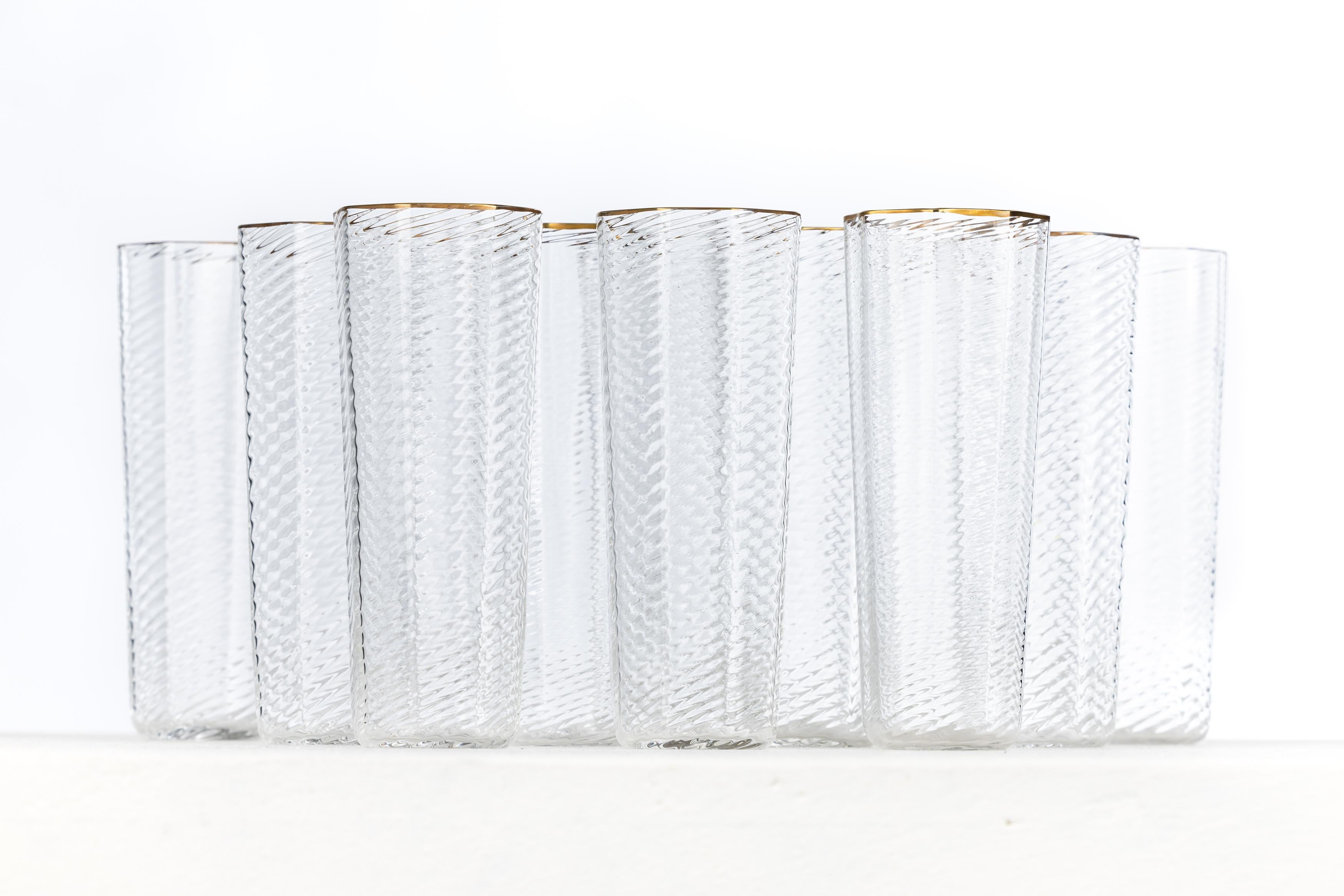 Importante juego de 12 vasos, vajilla, oro, diseño Murano Venini, años 70 Italia finales del siglo XX en venta