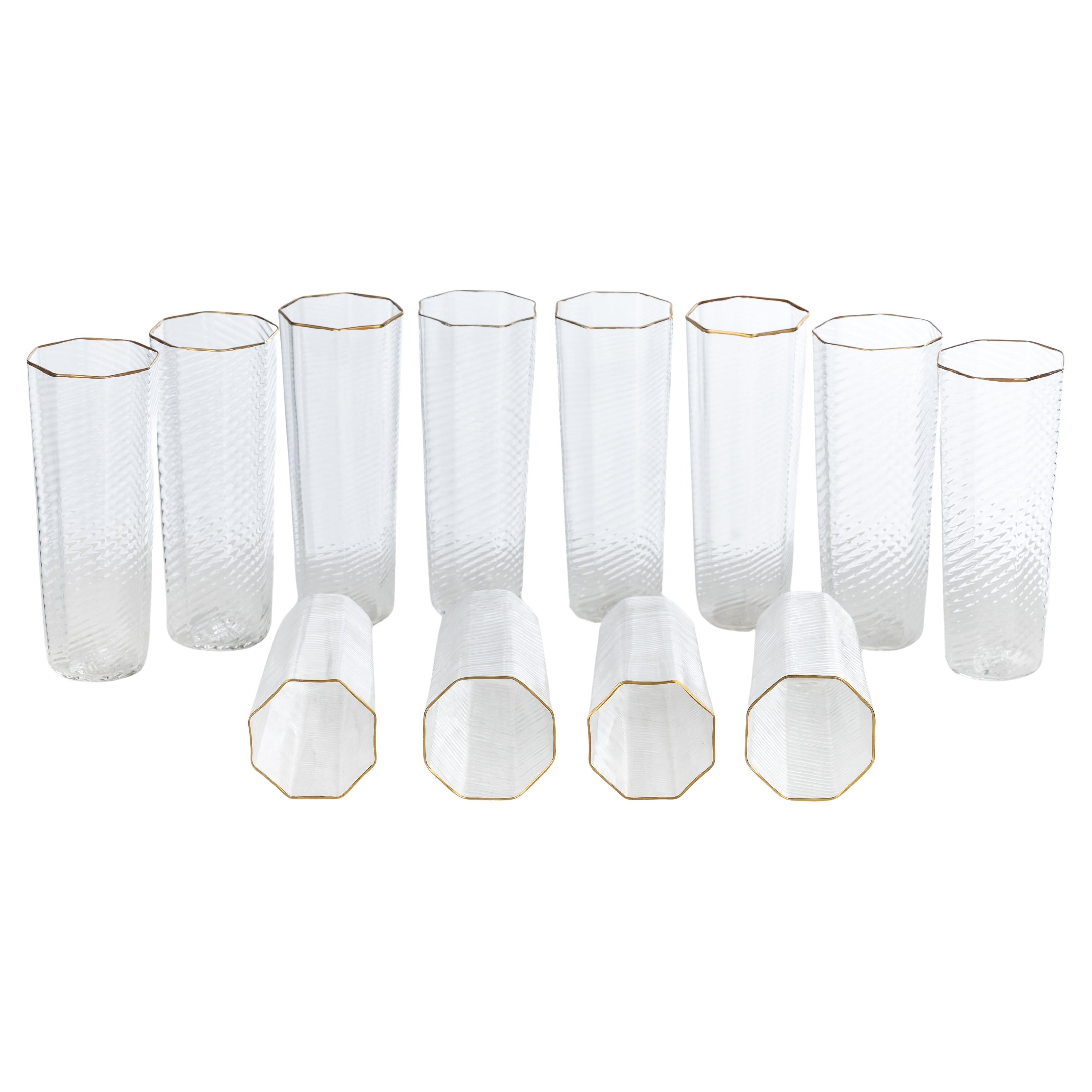 Important set of 12 glasses, tableware, gold, Murano design Venini, 1970s Italy