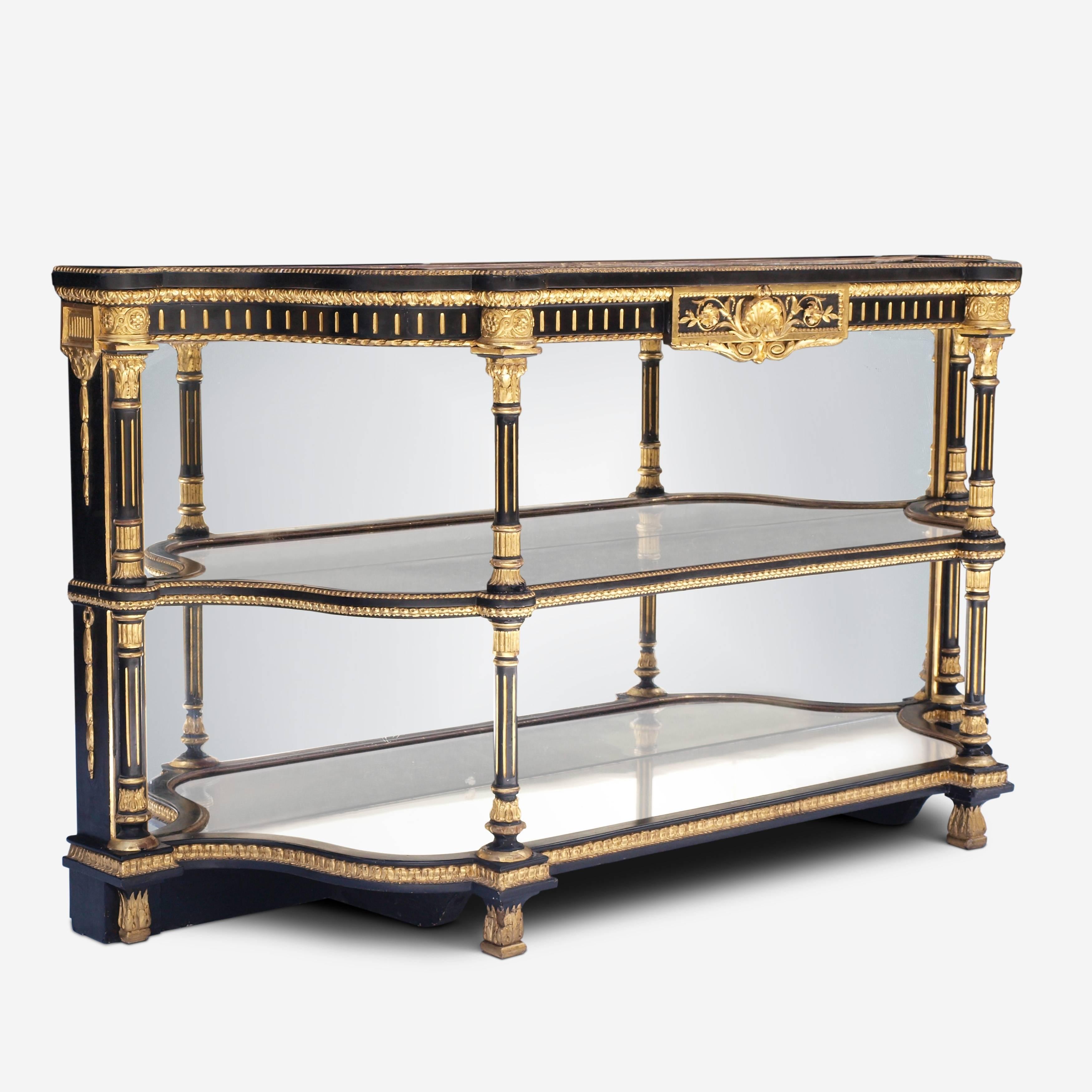 An important side cabinet by Charles Nosotti, one of the most significant suppliers of mirrors and furniture in London in the middle of the nineteenth century. 

This striking d shaped cabinet is ebonised and gilded with a mirror back