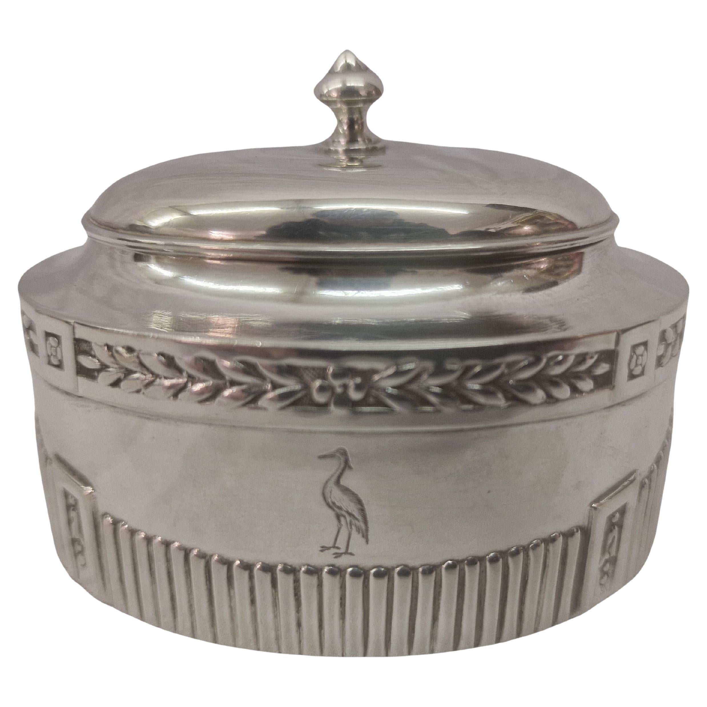 Special lidded box, made of silver, made by the famous Art Nouveau goldsmith Eugen Marcus in Germany, around 1910-20.

The lidded box has an oval shape and consists of two parts. The lower edge of the box is designed with bar decoration, which is