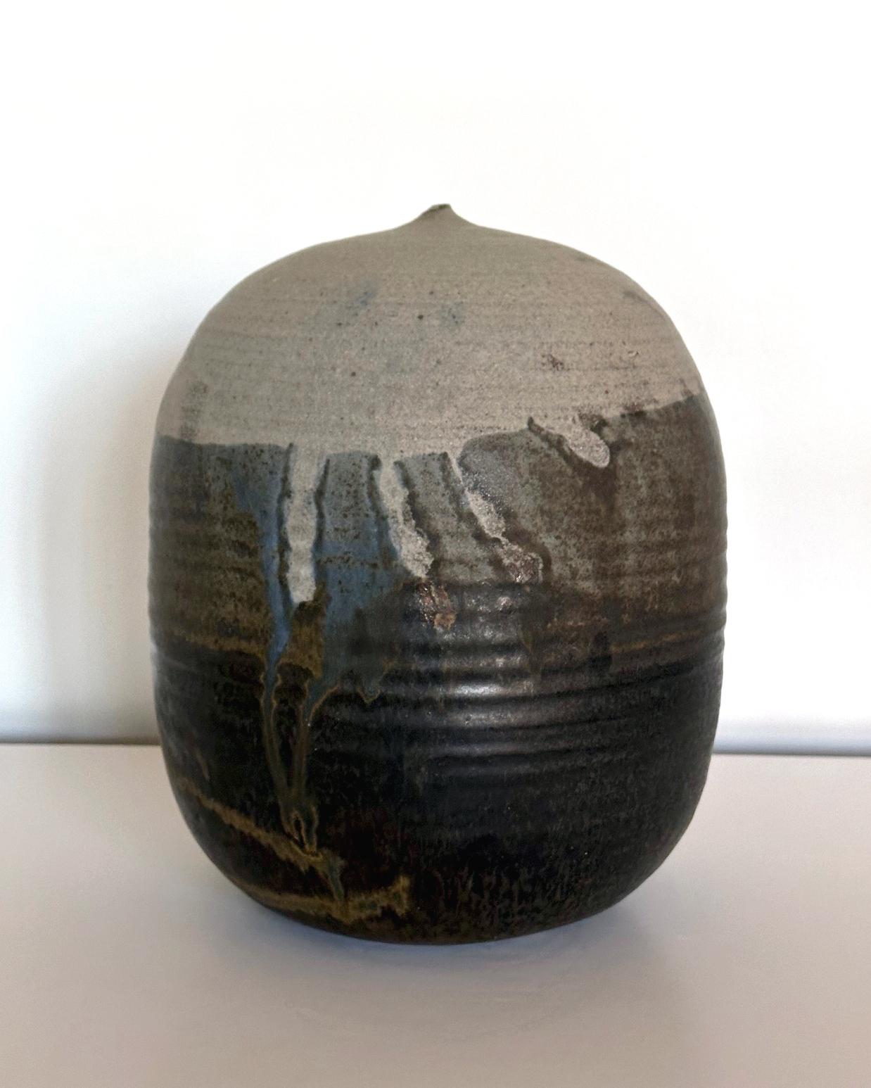 An important ceramic closed-form pot with rattle by Japanese American artist Toshiko Takaezu (American, 1922 - 2011).
The story: In the 1980s, potter Lola Rae invited Toshika to her ceramic studio and kiln in Ojai, CA to teach a class. Lola Rae had
