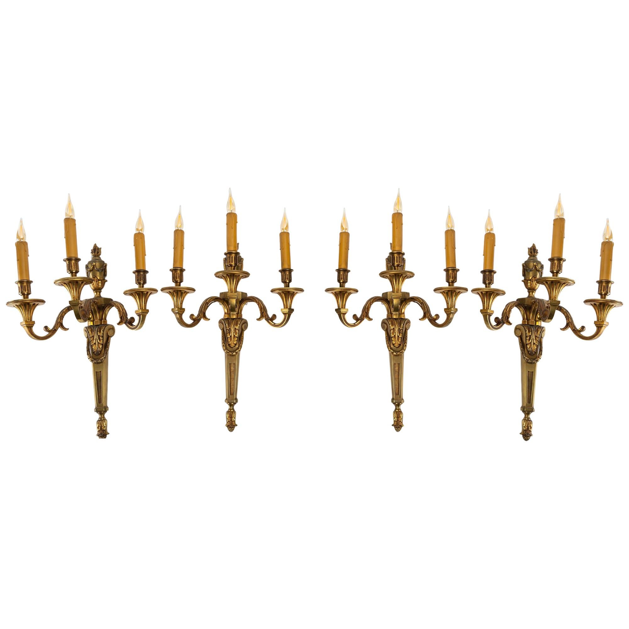 Important Suite of Four Bronze Sconces