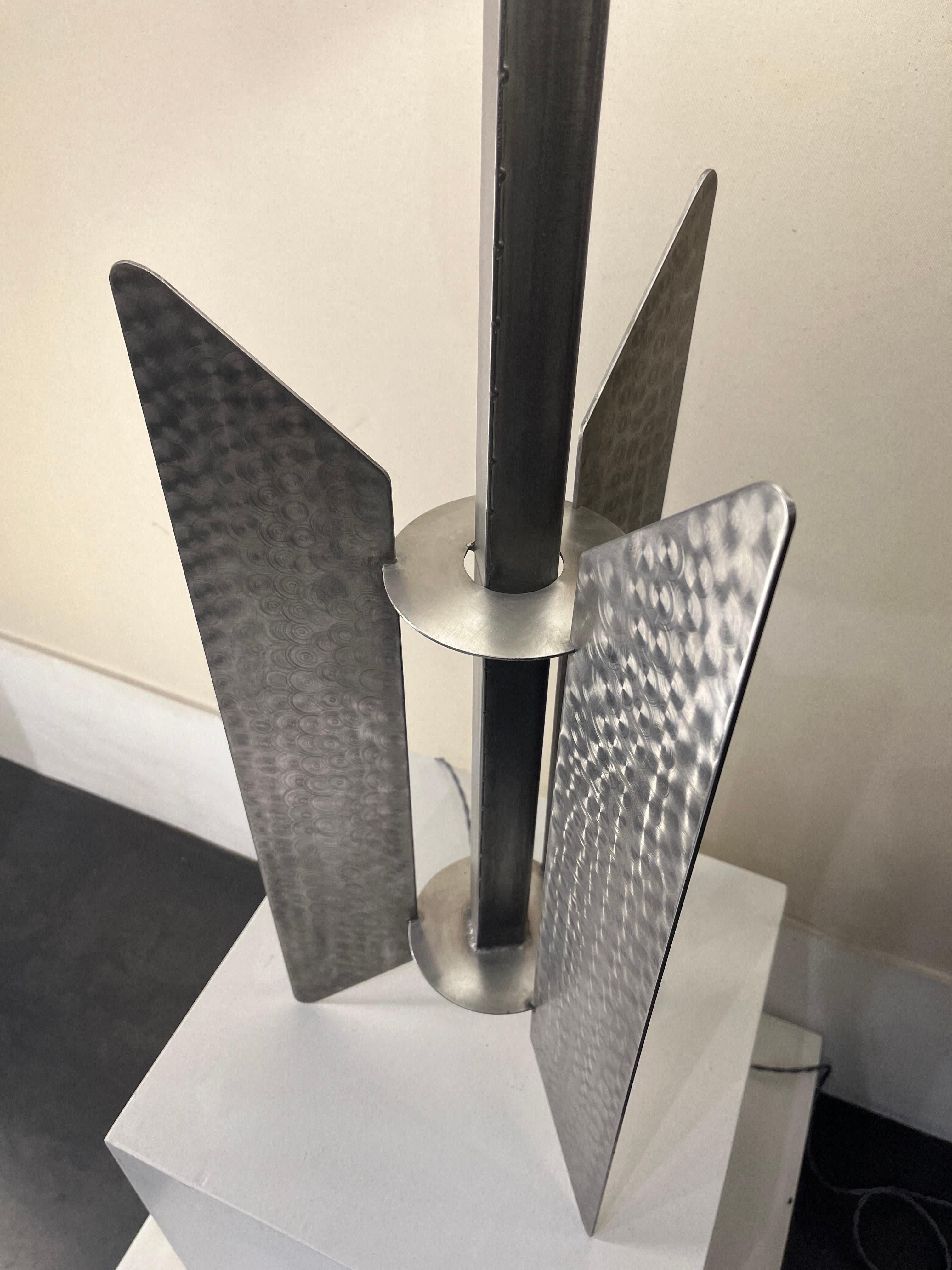 Important table lamp in stainless steel, sculptors work, France circa 1970’s.
Amazing piece.