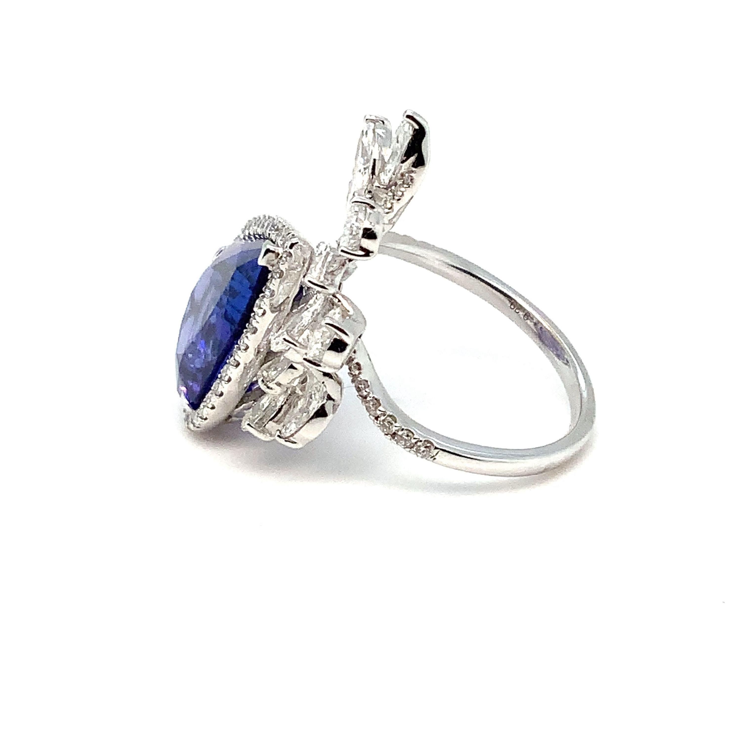 Pear Cut Important Tanzanite and Diamond  Right Hand Ring Fashioned in 18K White Gold. For Sale