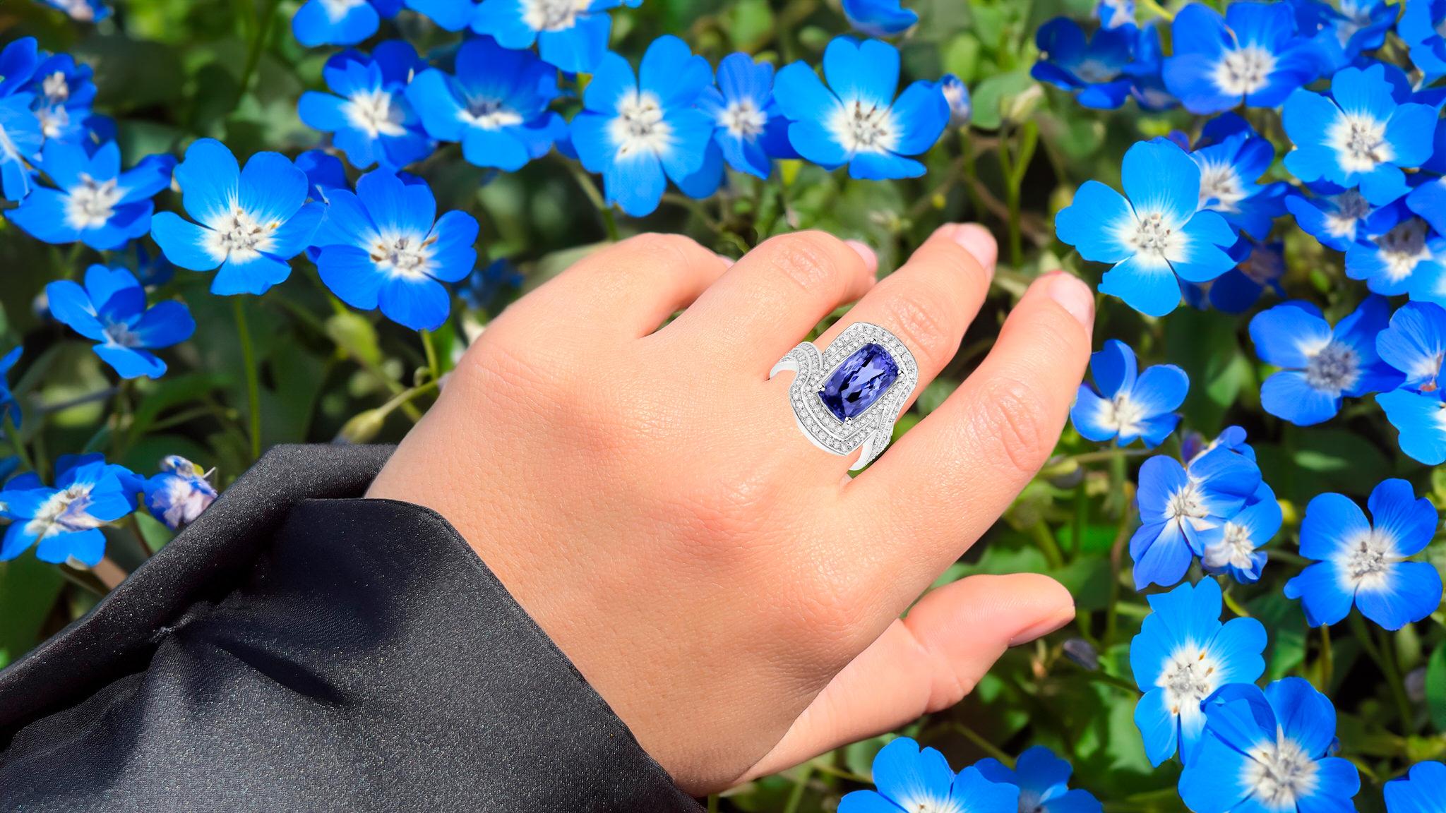 Contemporary Important Tanzanite Bypass Ring Double Diamond Halo 6.63 Carats For Sale