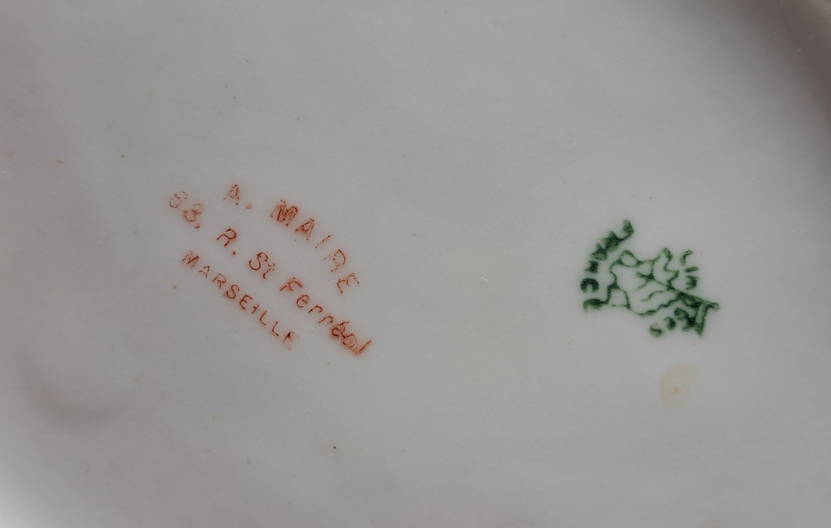 Important service in fine Limoges porcelain decorated with polychrome garlands in the Louis XVI style composed of:
1 tea service composed of 12 cups and saucers
1 coffee service composed of 7 cups and saucers
1 jug
1 milk jug
1 sugar bowl

Porcelain