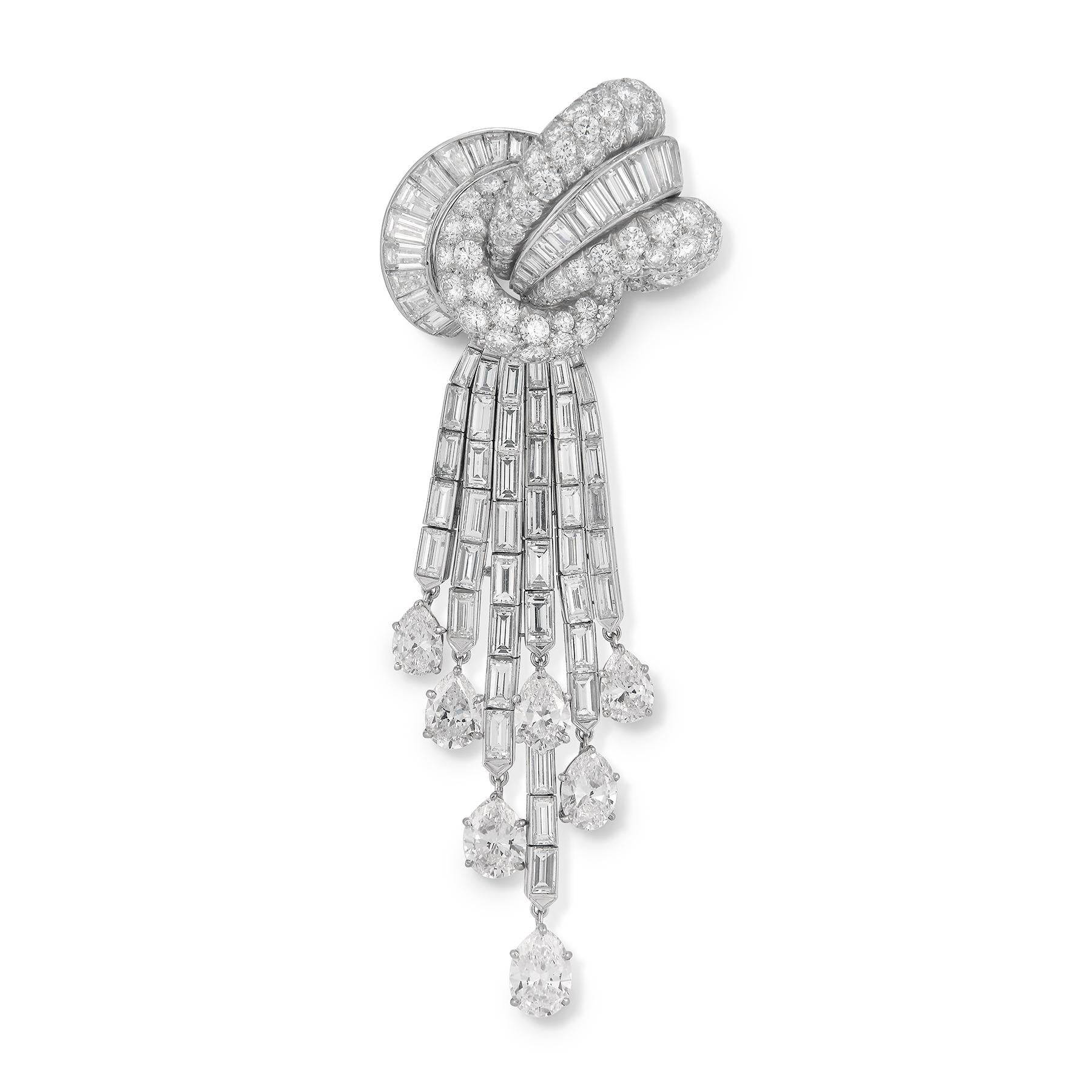 Important Van Cleef & Arpels Diamond Cascade Brooch

Variously cut diamonds weighing approximately 20-25 carats 

Largest pear shape measures as over 1 carat each

Measurements: 3.5