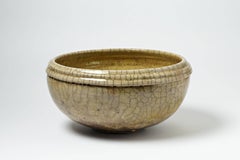 Important bol en céramique blanche et jaune de Giselle Buthod-Garcon, vers 1980