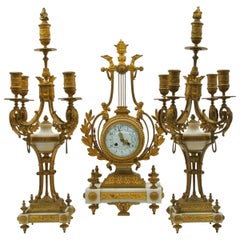 Important White Marble and Golden Bronze Mantel Set
