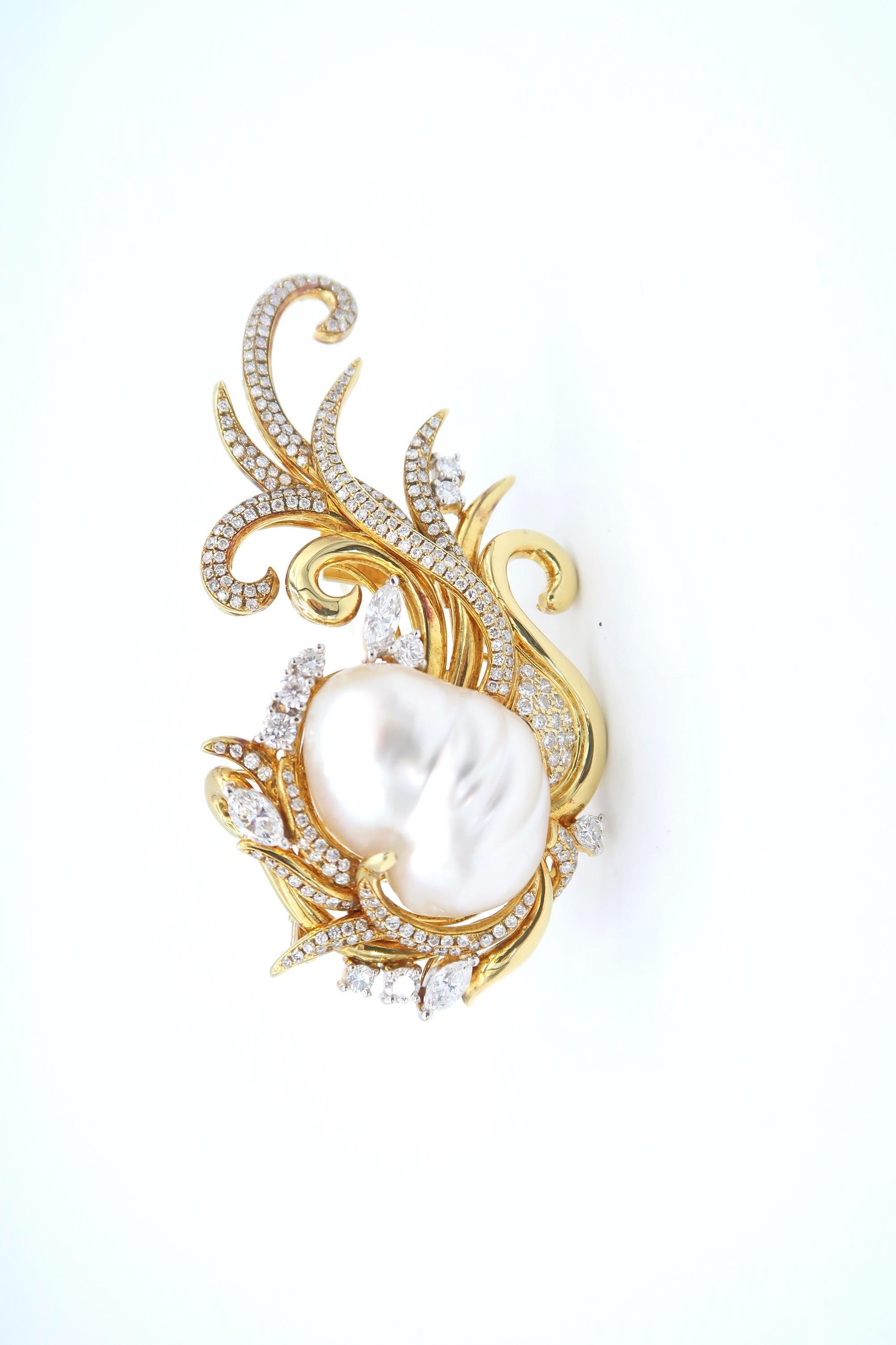 pearl and gold brooch