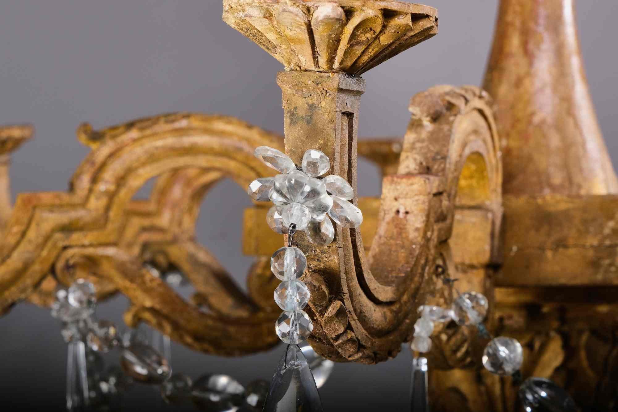 Important woodcarved and gilted Louis XVI chandelier, Italy, late 18th century In Fair Condition For Sale In Walkertshofen, BY