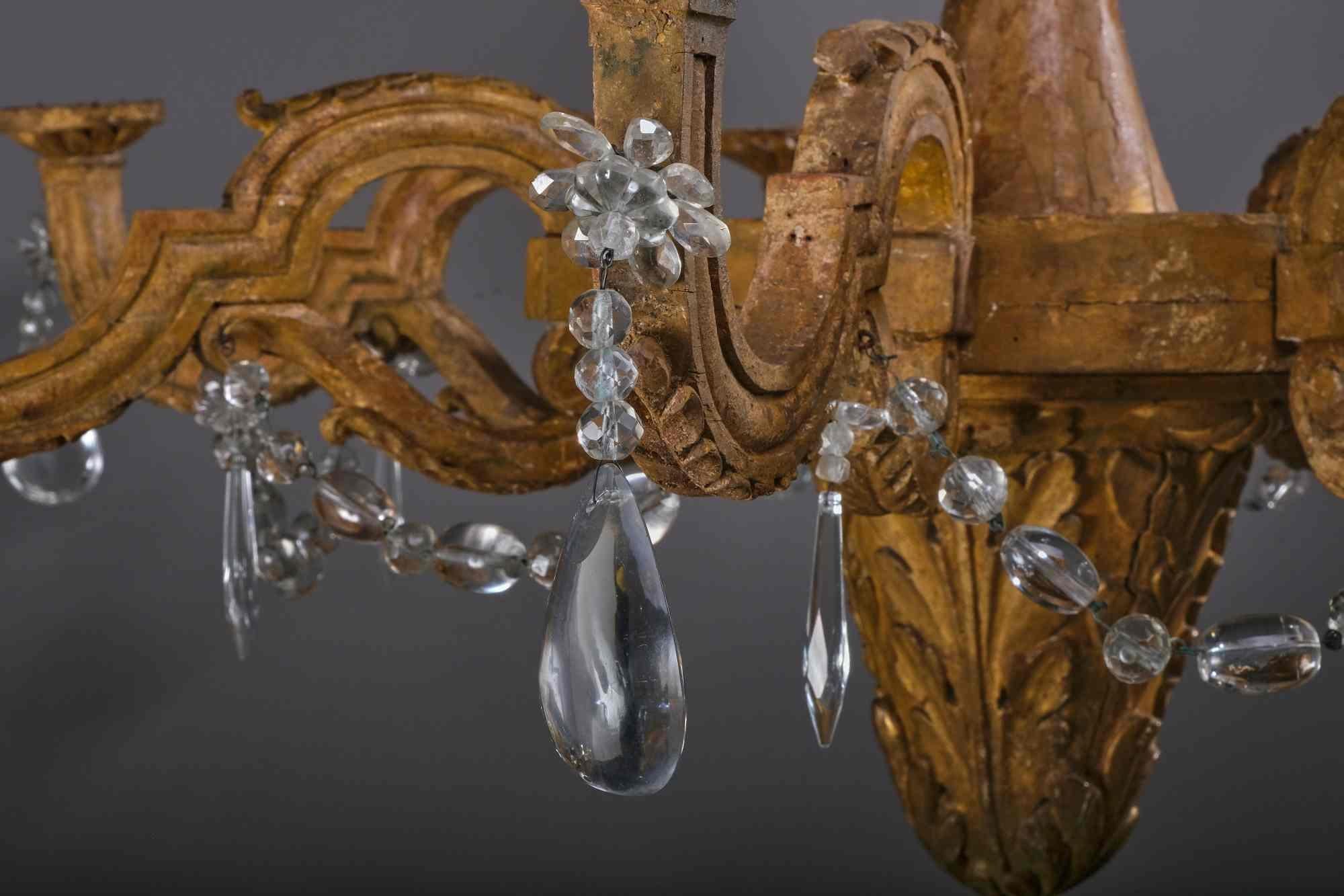 Wood Important woodcarved and gilted Louis XVI chandelier, Italy, late 18th century For Sale