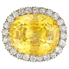 Importante broche/anillo de zafiro amarillo y racimo de diamantes
