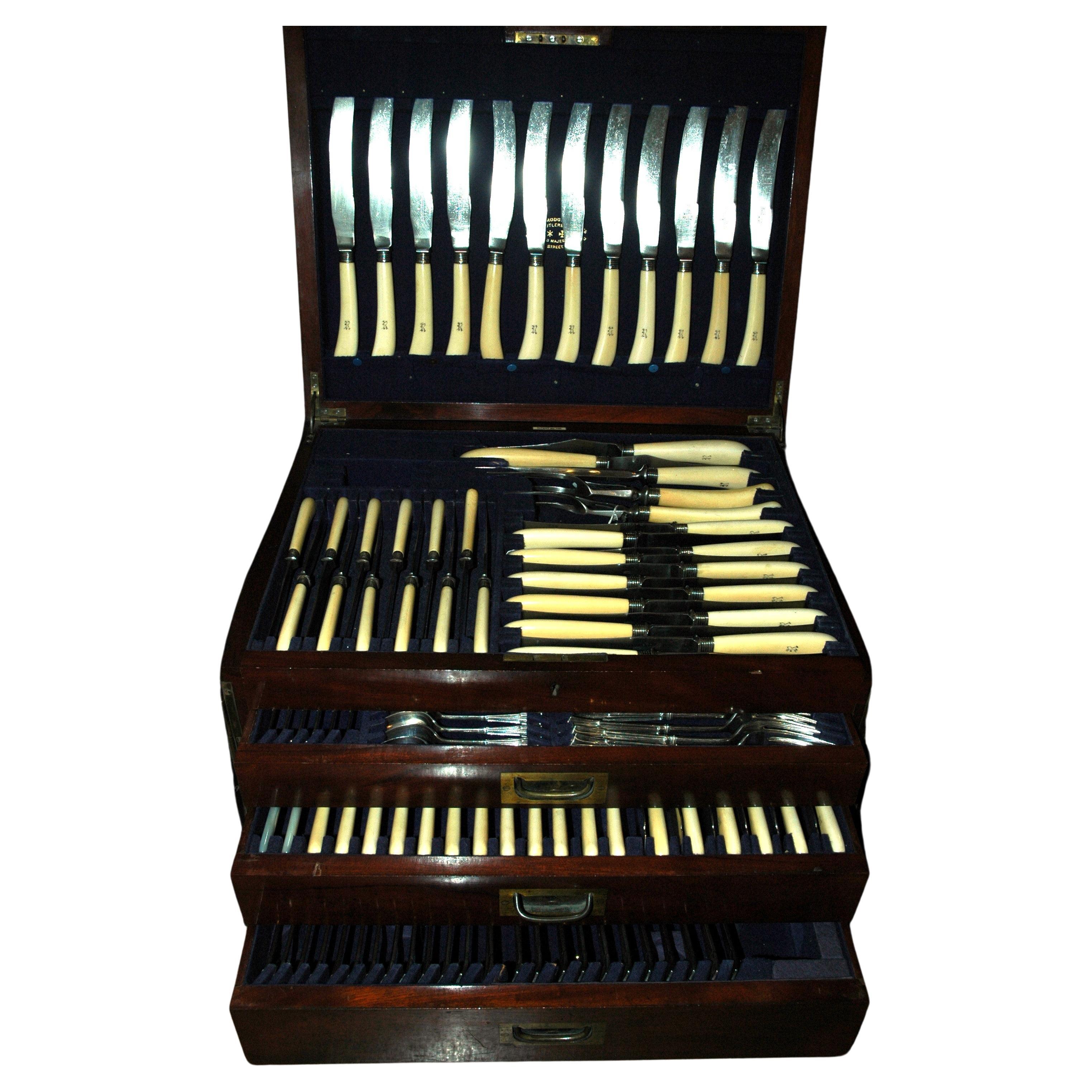 Important antique silver cutlery service with storage cabinet For Sale