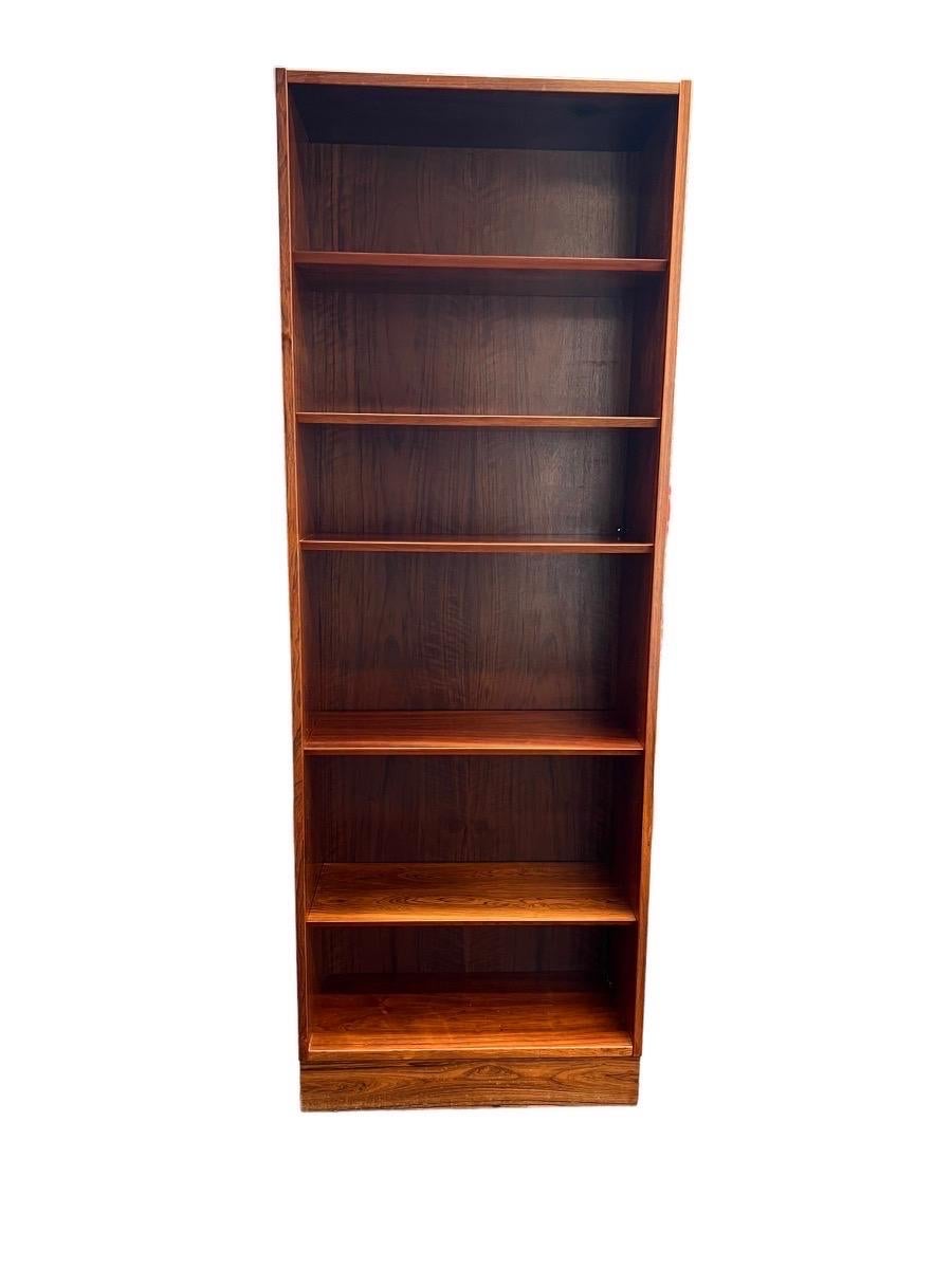 Imported Danish Mid Century Modern Bookshelf Bookcase with Adjustable Shelves Poul Hundevad Rosewood 

Dimensions. 28 W ; 12 D ; 77 H