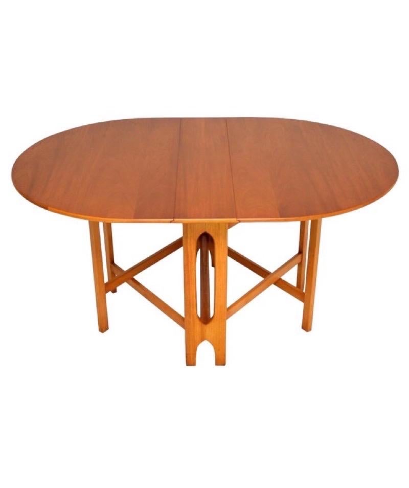 Imported Vintage Mid-Century Modern Walnut Gateleg Extended Dining Table

Dimensions. 61 W ; 43 D ; 30 H ( Extended 2 Leaves)
 36 W ( Extended 1 Leave )
 10 W ( 2 Leaves Closed ).