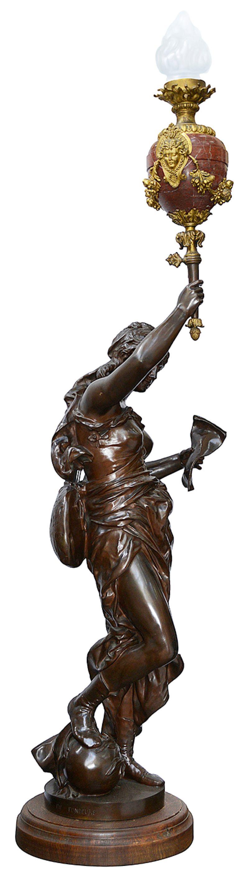 Néoclassique Torchère en bronze du 19ème siècle, par Coutan. en vente