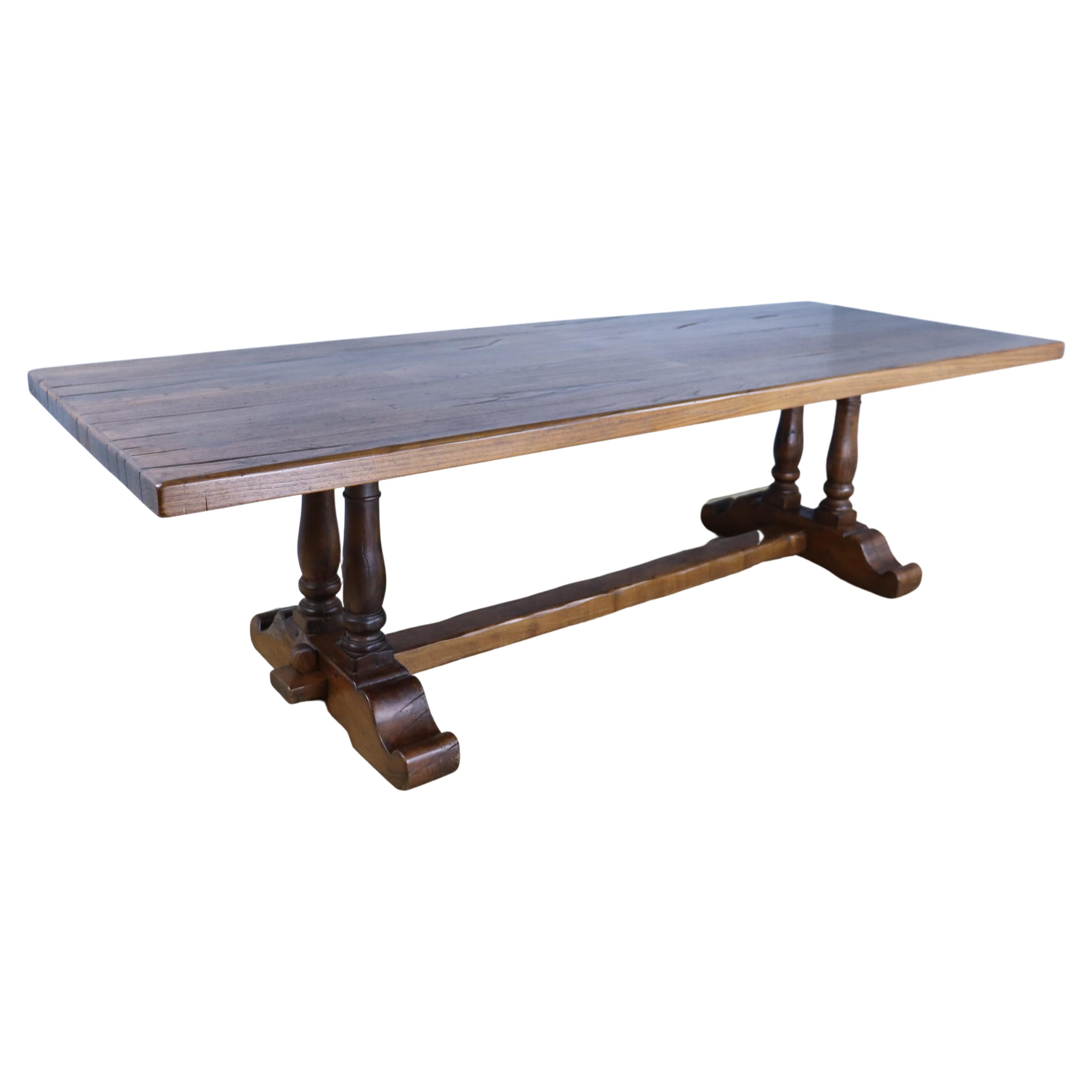 Imposing 19th Century Oak Dining Table with Double Barrel Supports For Sale