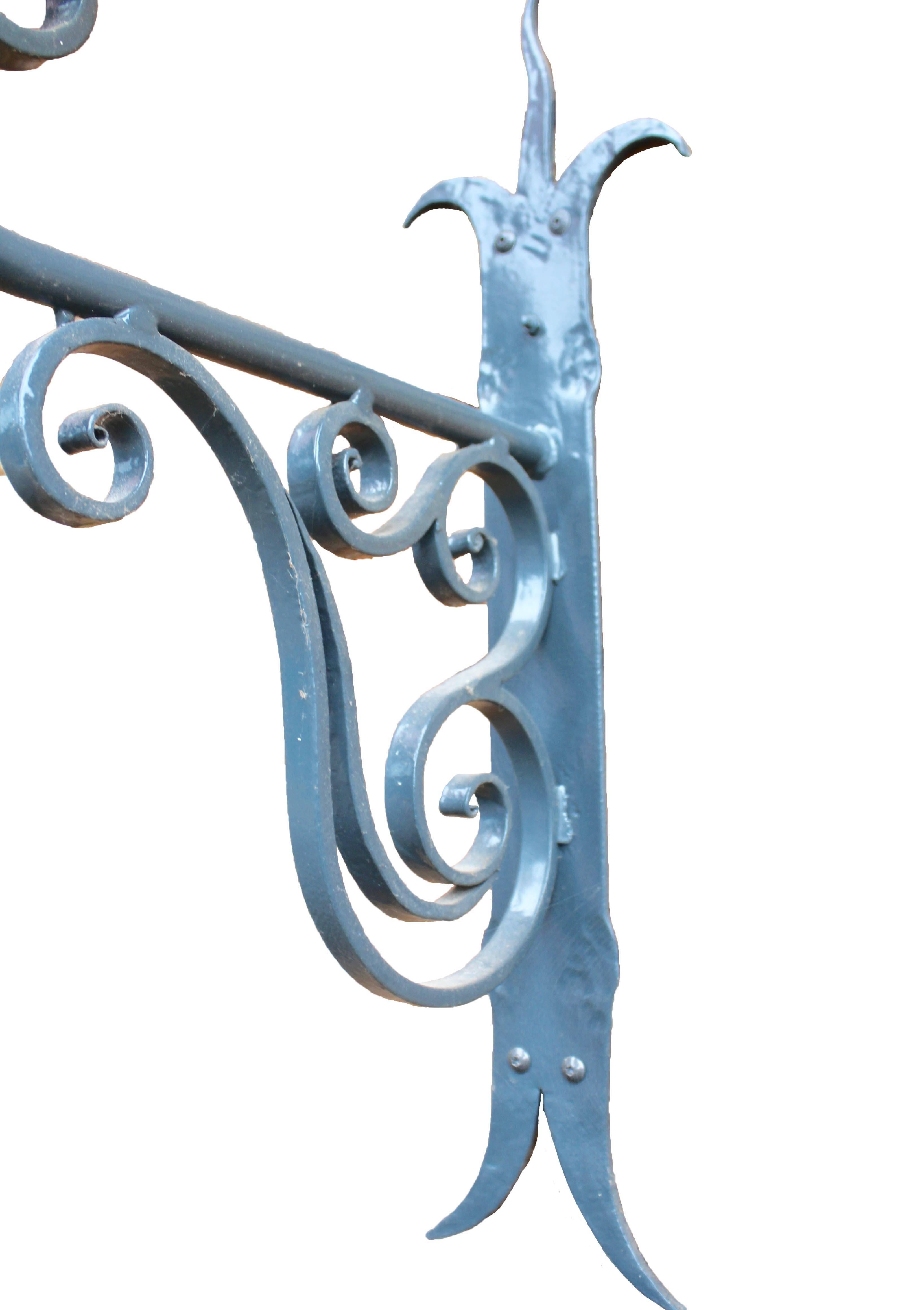 Beautiful imposing wrought iron outdoor lamp.

Completely restored new cable and fitting also galvanized and painted in the color RAL 7026.
The piece is in excellent condition and a real beauty!
Can once again be used many years.
Every